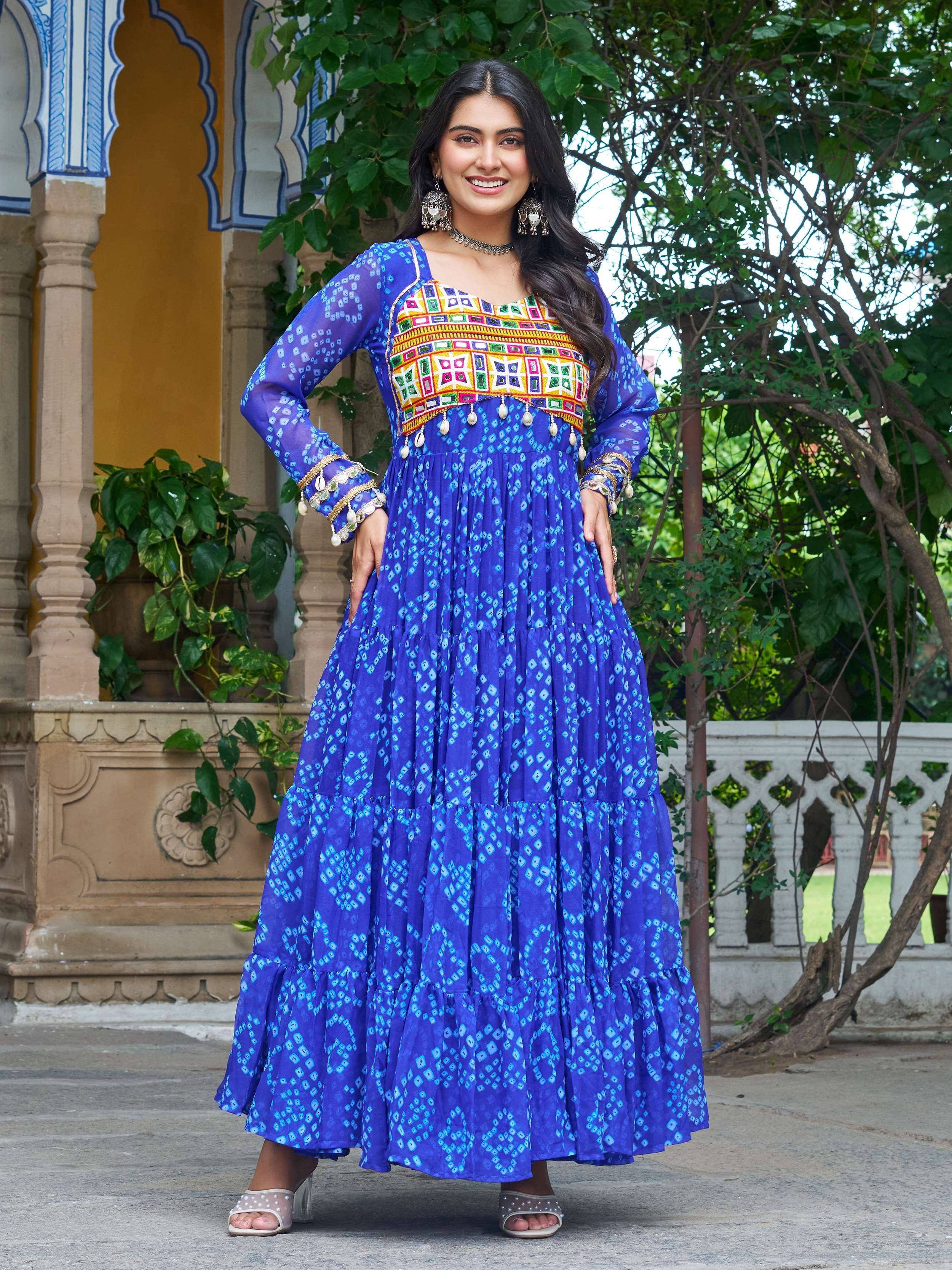 Blue printed ethnic gown with colorful embroidery and mirror work, perfect for festive occasions