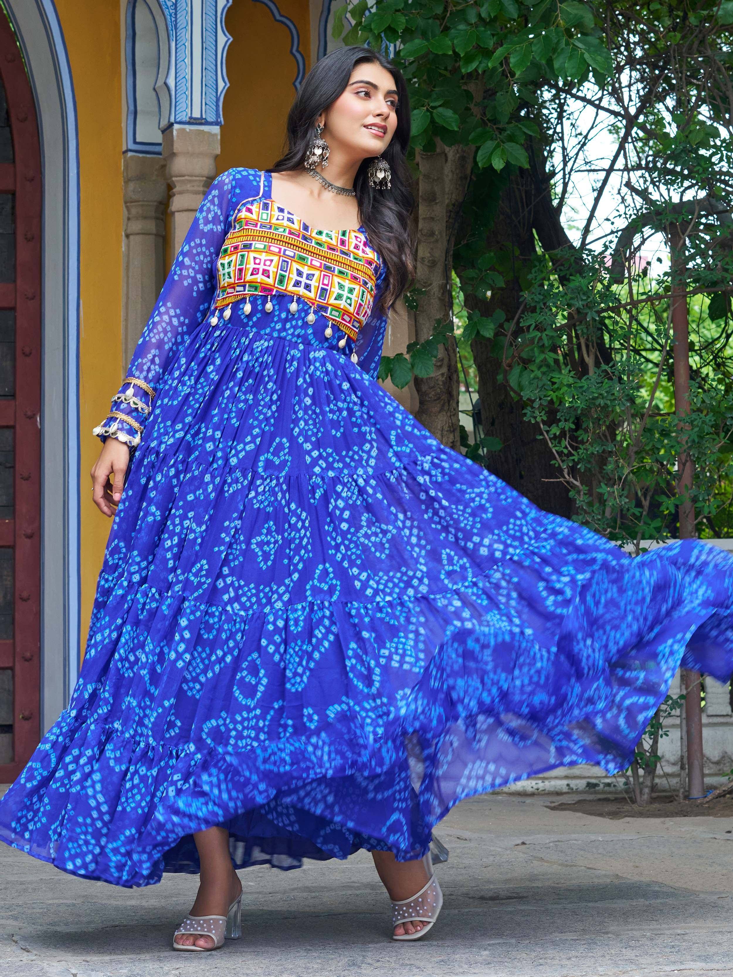 Blue printed ethnic gown with colorful embroidery, perfect for Indian festive occasions