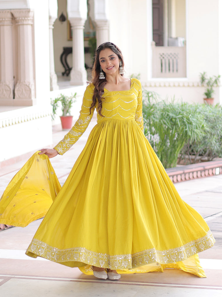 Charming Yellow Sequins Embroidered Silk Festive Wear Gown