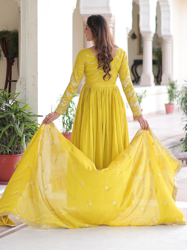 Charming Yellow Sequins Embroidered Silk Festive Wear Gown