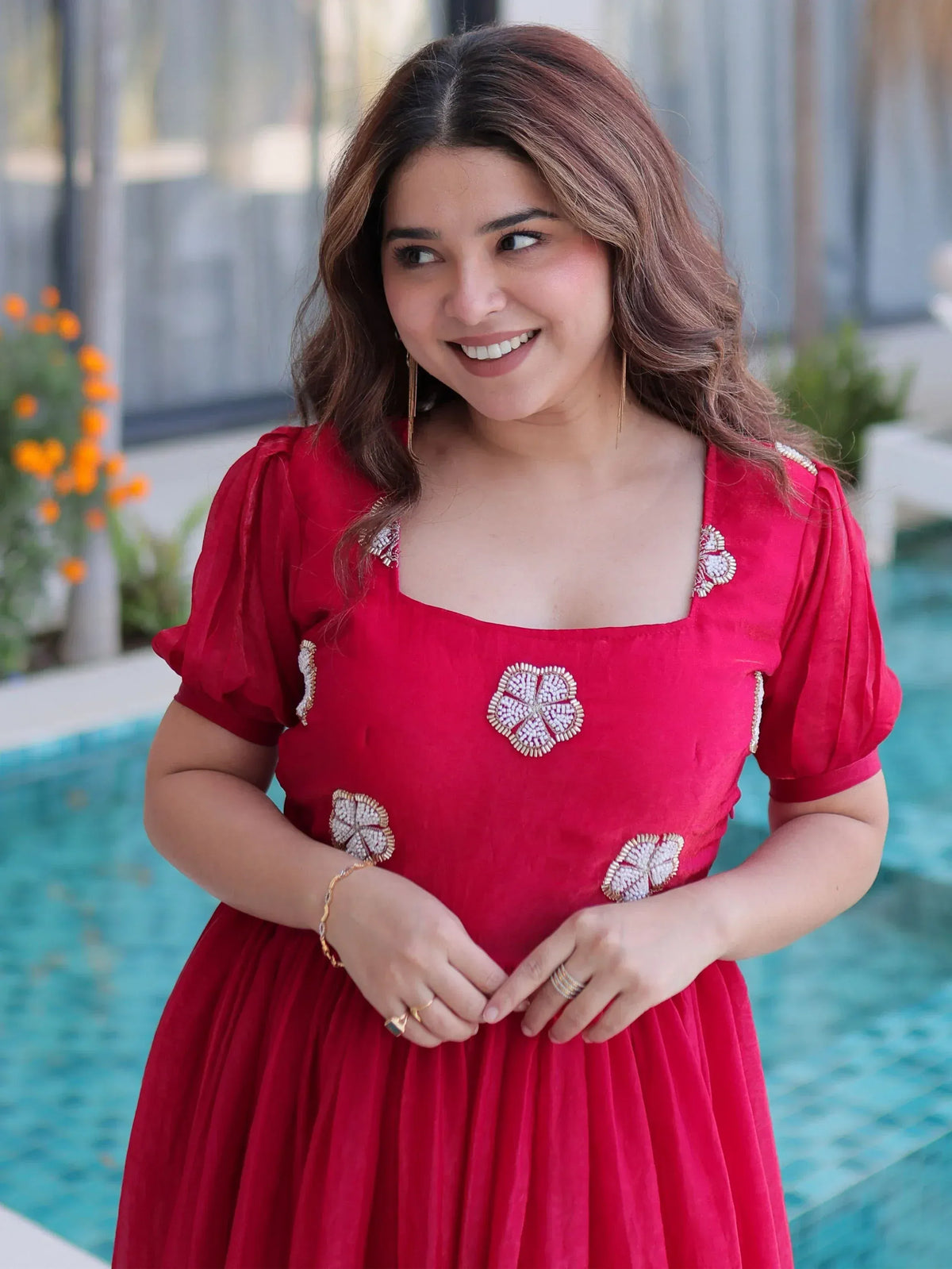Red ethnic gown with floral embroidery, perfect for Indian occasions and festive wear