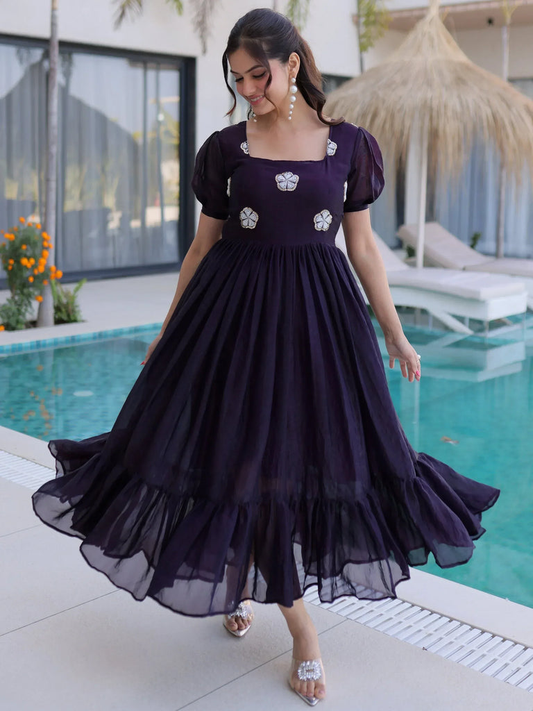 Elegant purple ethnic gown with floral embroidery, perfect for parties and weddings