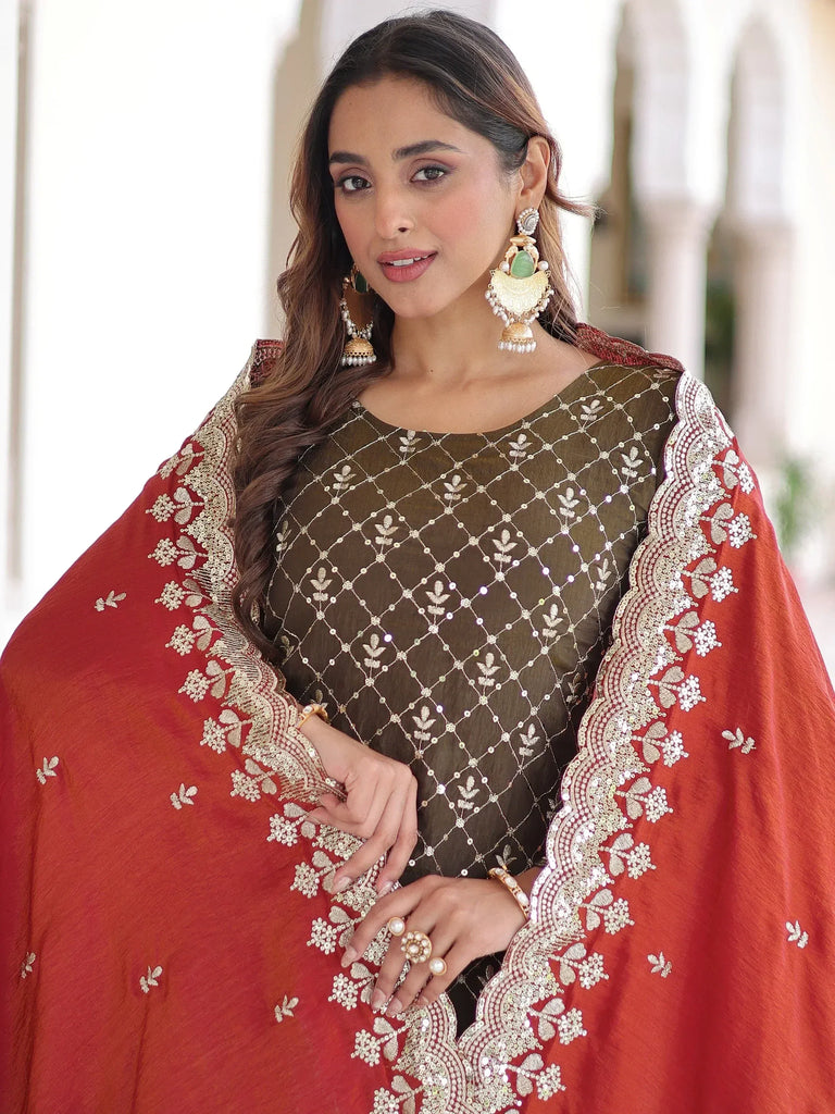Wonderful Green And Red Embroidered Silk Function Wear Sharara Suit