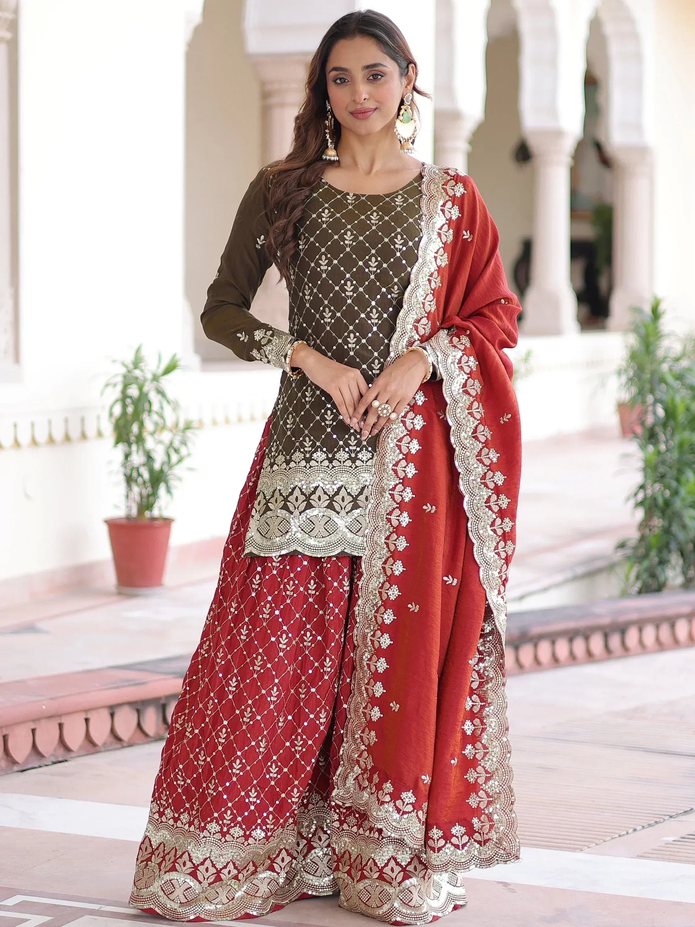 Wonderful Green And Red Embroidered Silk Function Wear Sharara Suit