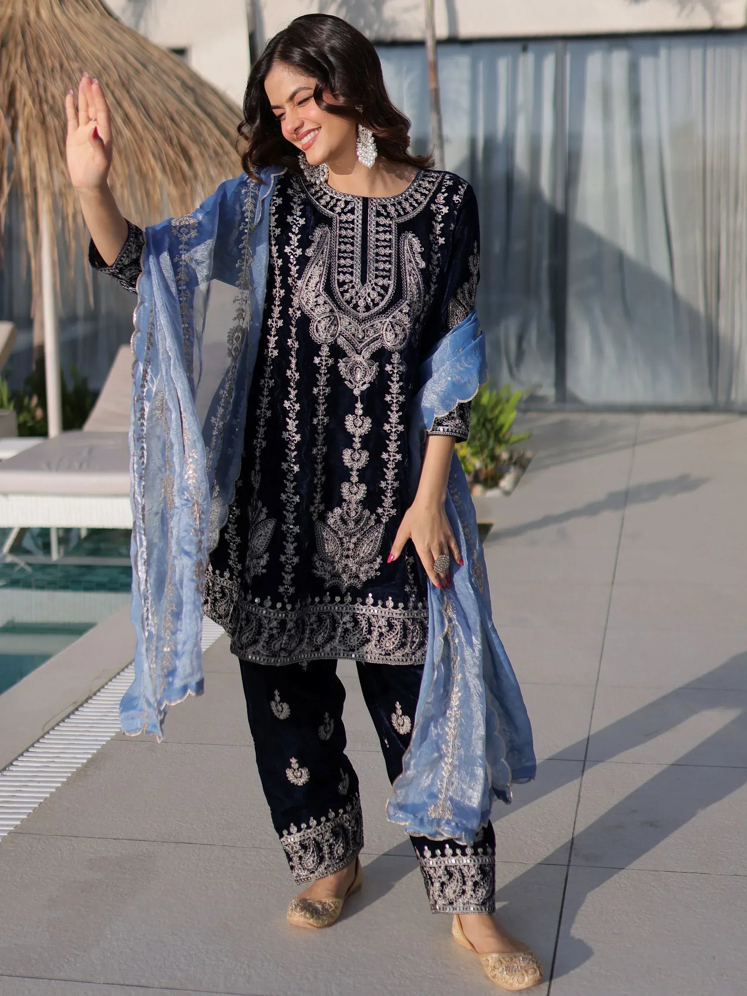 Impressive Blue Zari Embroidered Velvet Festive Wear Salwar Kameez