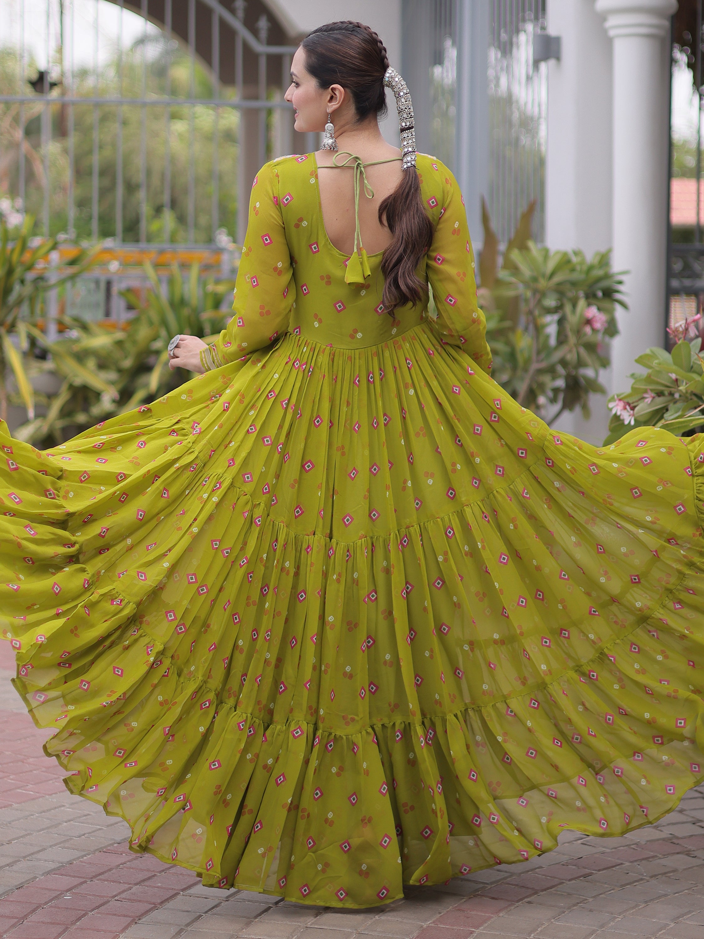 Notable Olive Green Laheriya Printed Georgette Navratri Wear Gown