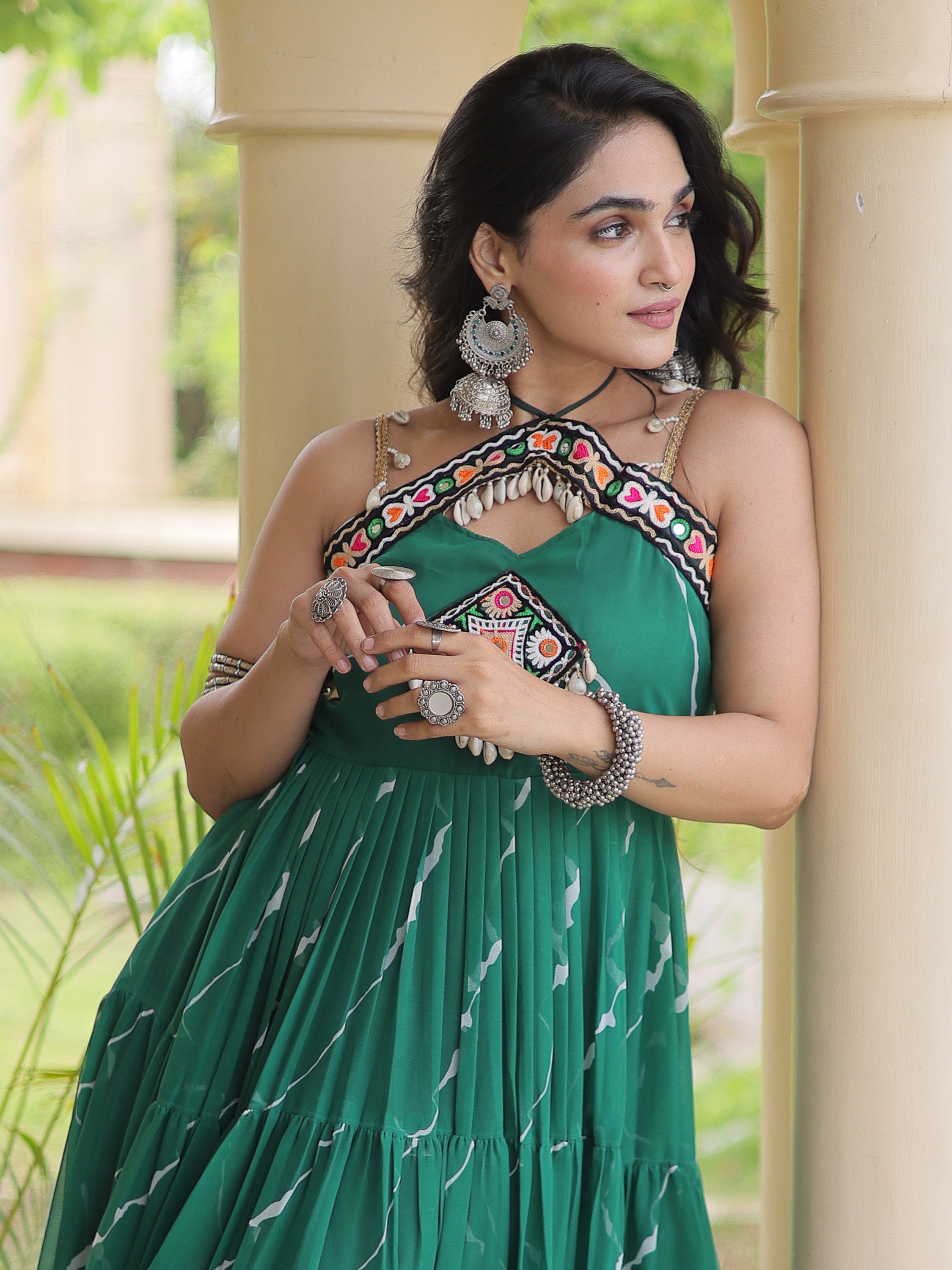 Striking Bottle Green Laheriya Printed Georgette Navratri Wear Gown
