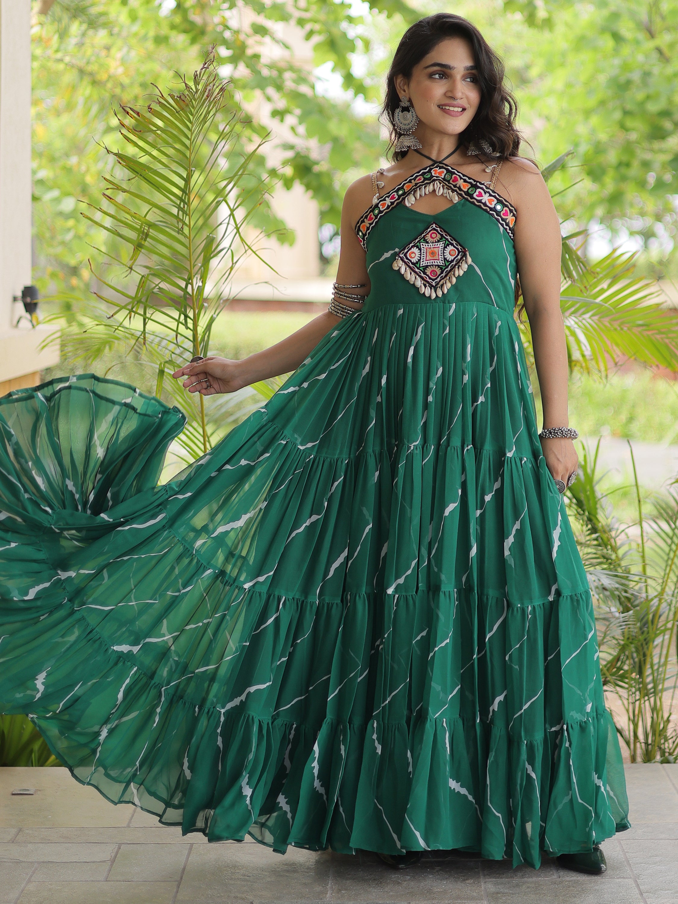 Striking Bottle Green Laheriya Printed Georgette Navratri Wear Gown