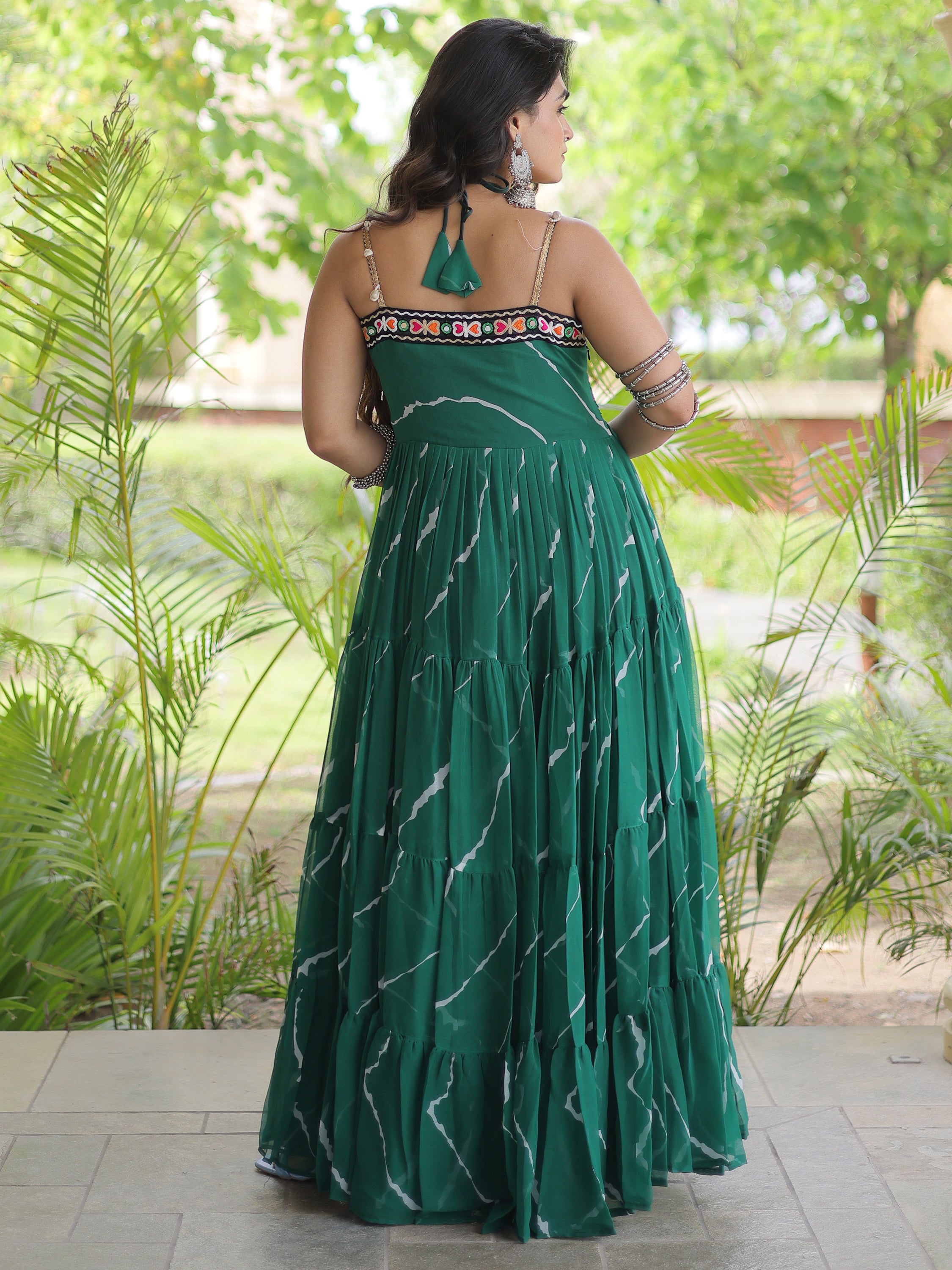Striking Bottle Green Laheriya Printed Georgette Navratri Wear Gown