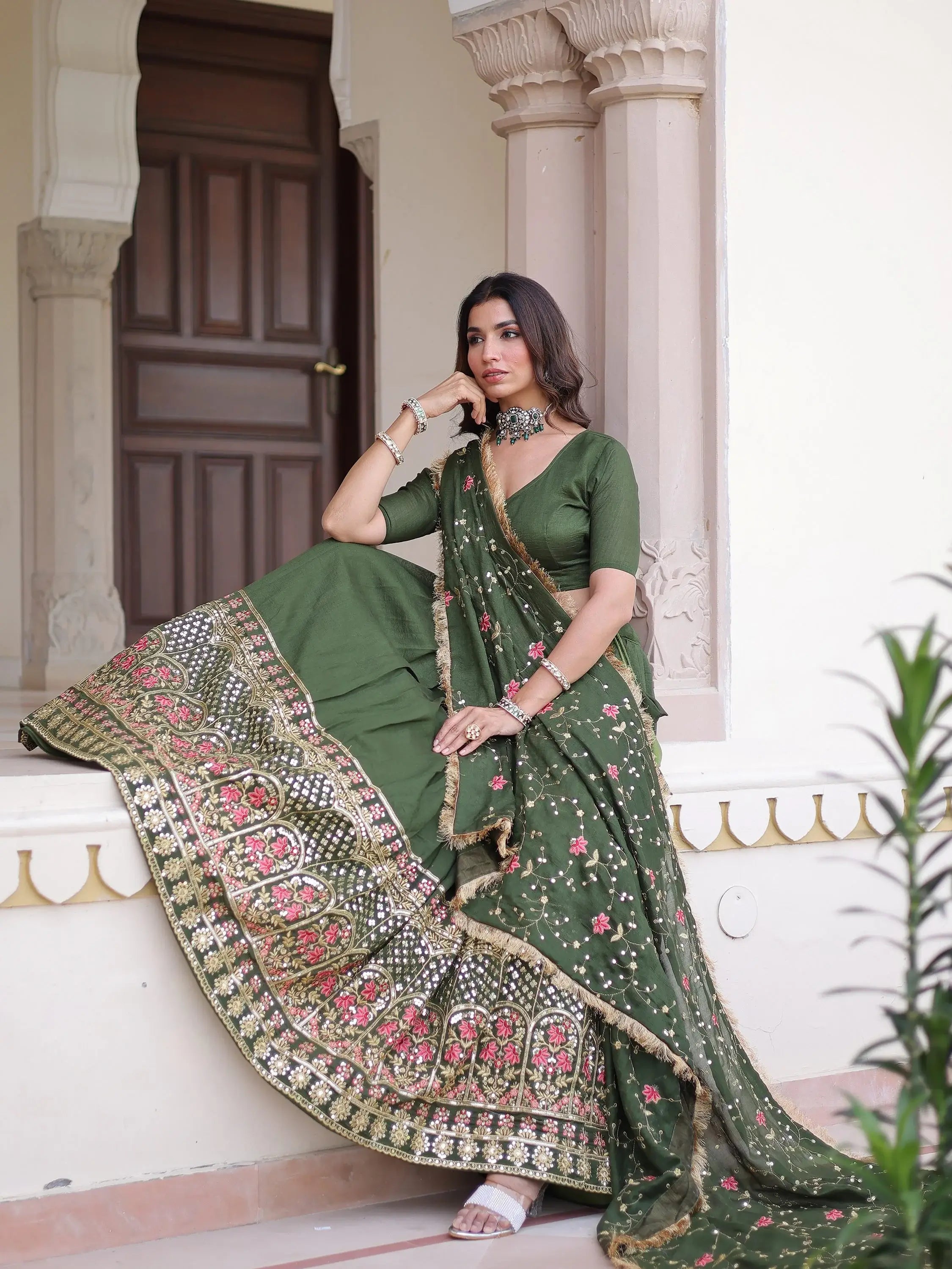Stunning Green Heavy Sequins Embroidered Silk Festive Wear Lehenga Choli