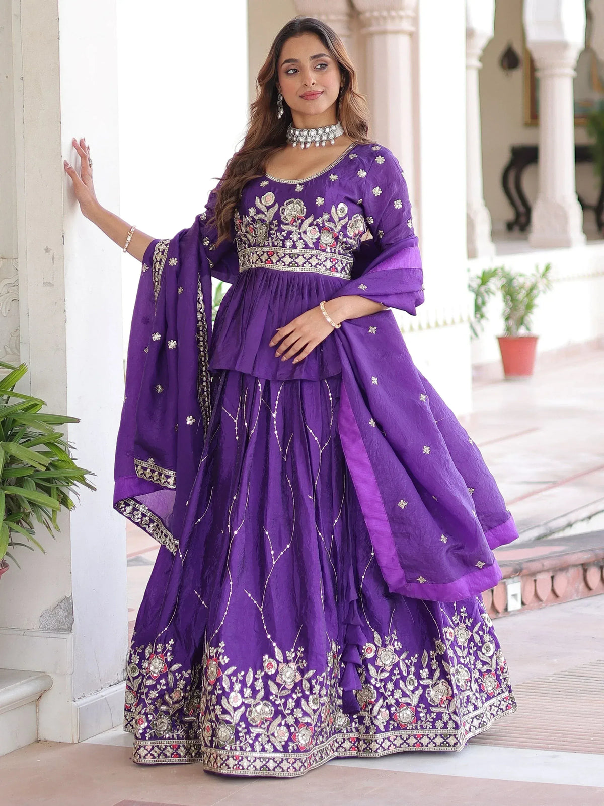 Purple embroidered lehenga choli with floral motifs and dupatta, ideal for Indian ethnic wear occasions