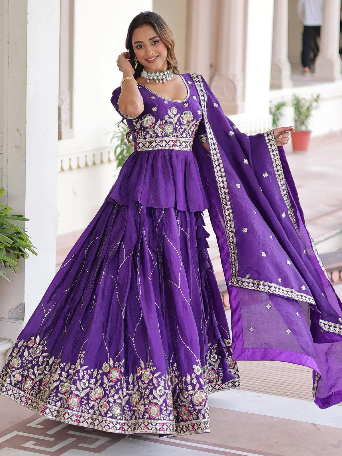Purple embroidered lehenga choli with floral motifs and dupatta, perfect for Indian ethnic occasions
