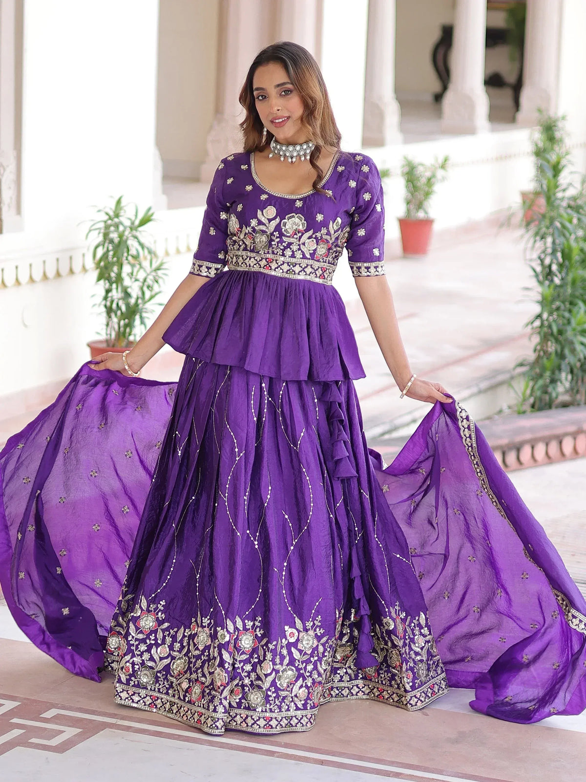 Purple embroidered lehenga choli with floral motifs, perfect for Indian ethnic wear occasions