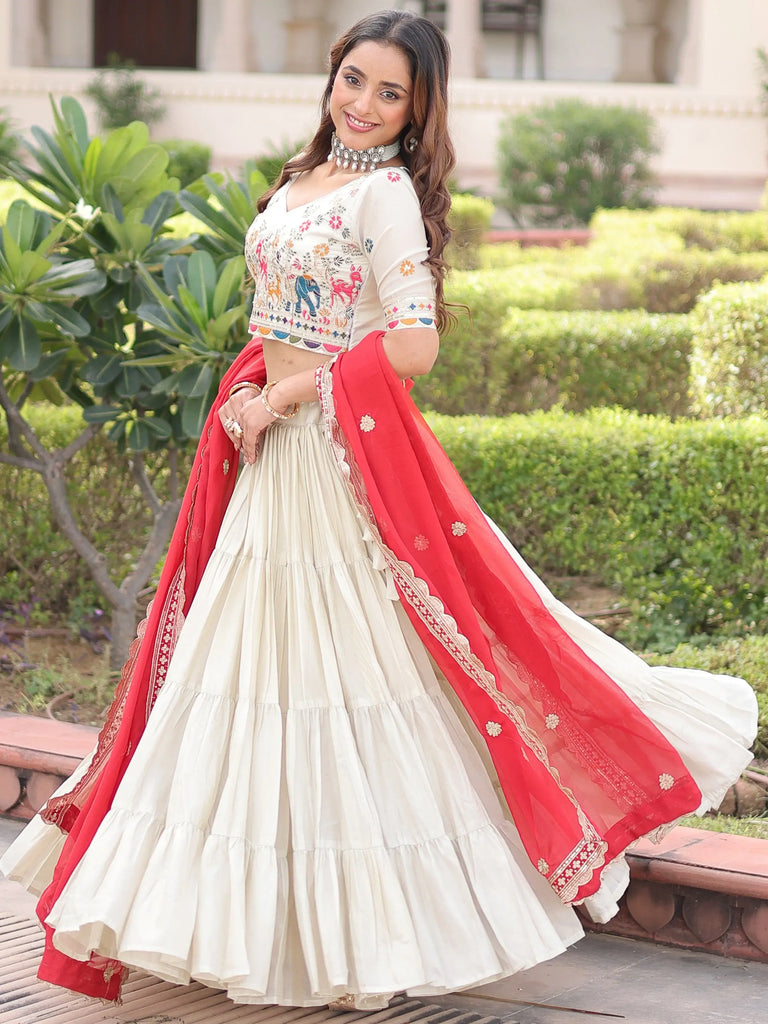 Sparkling Off-White Embroidered Silk Wedding Wear Lehenga Choli