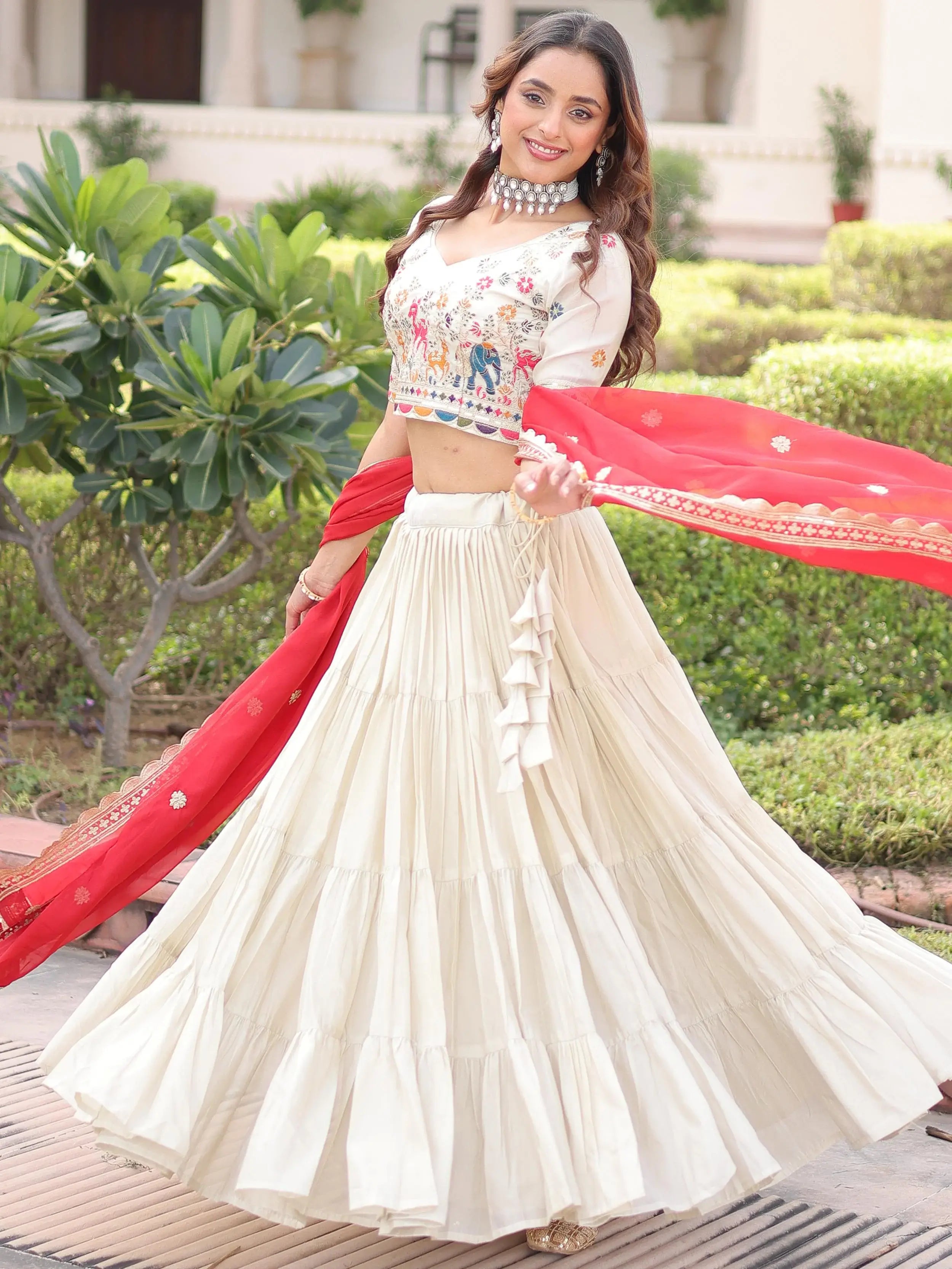 Sparkling Off-White Embroidered Silk Wedding Wear Lehenga Choli