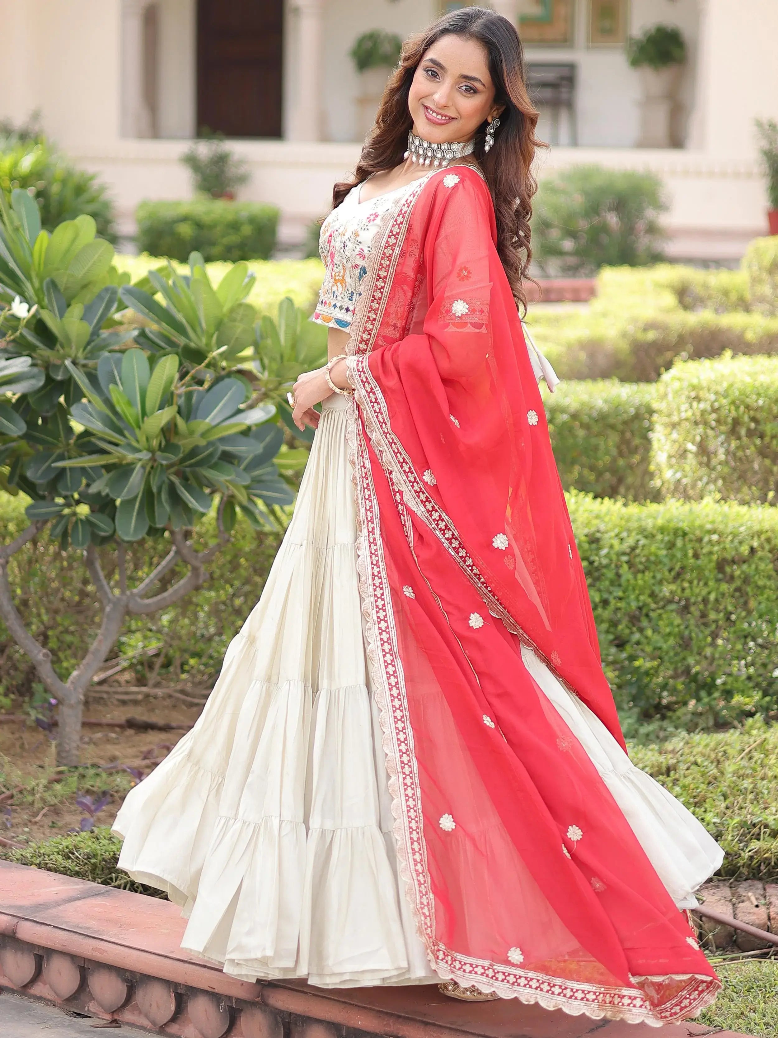 Sparkling Off-White Embroidered Silk Wedding Wear Lehenga Choli