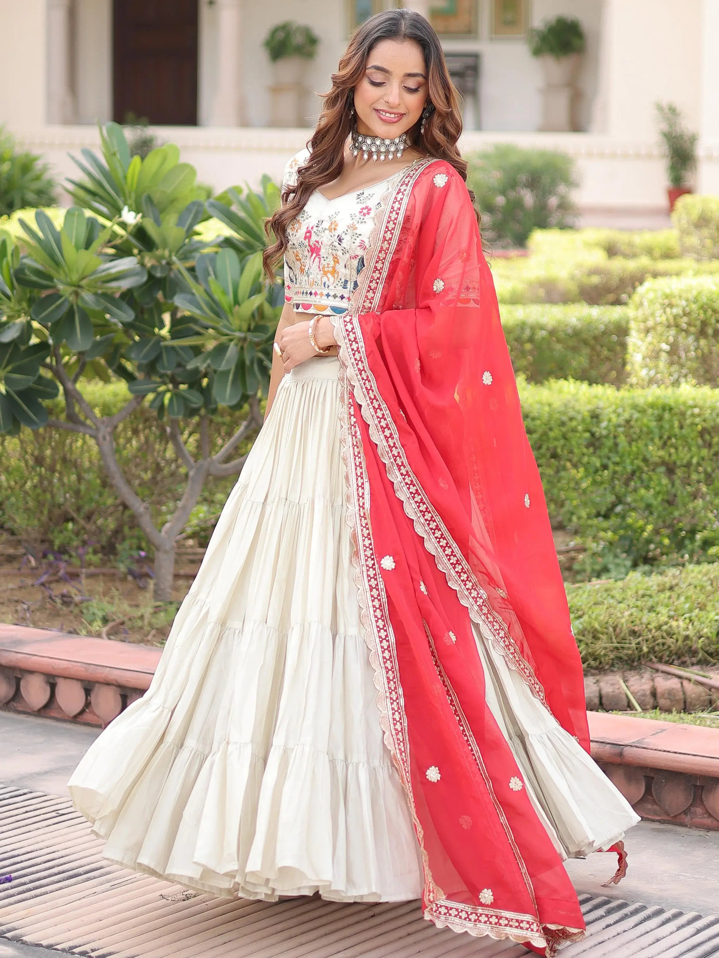 Sparkling Off-White Embroidered Silk Wedding Wear Lehenga Choli