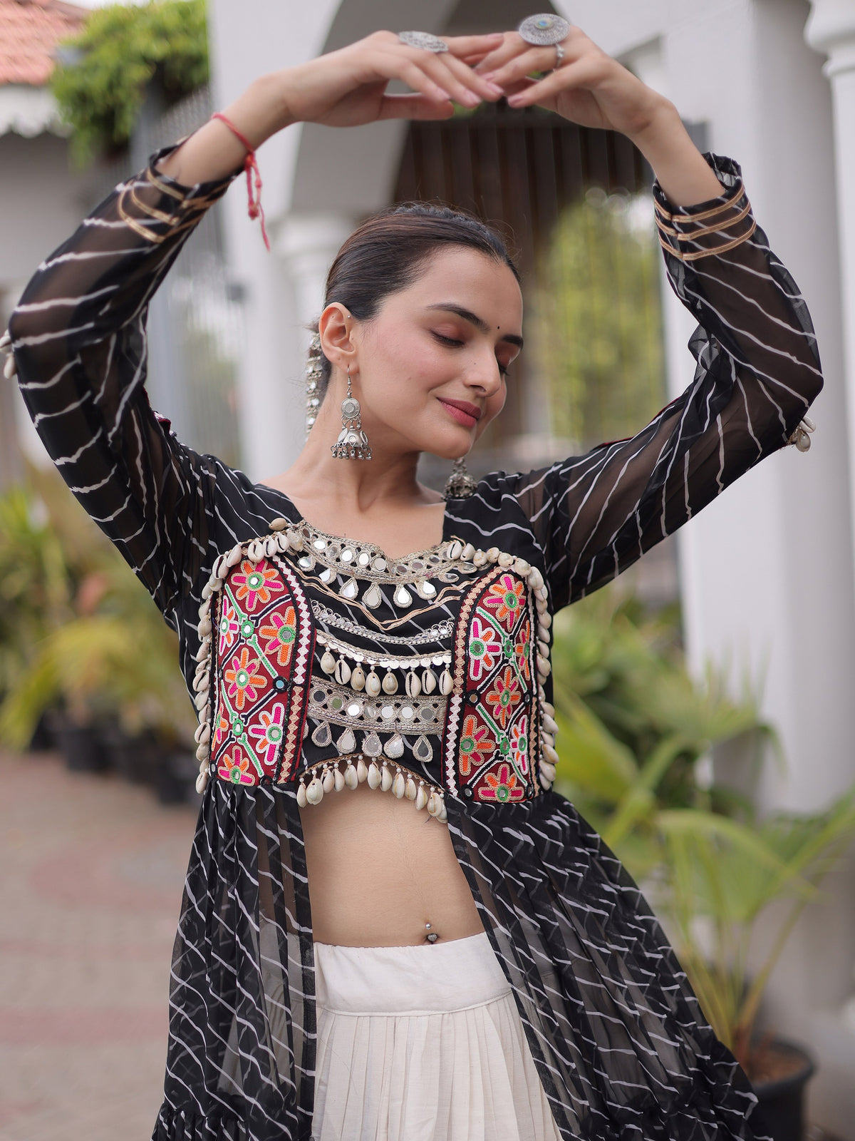 Grand Black Laheriya Printed Cotton Navratri Wear Lehenga With Kurti