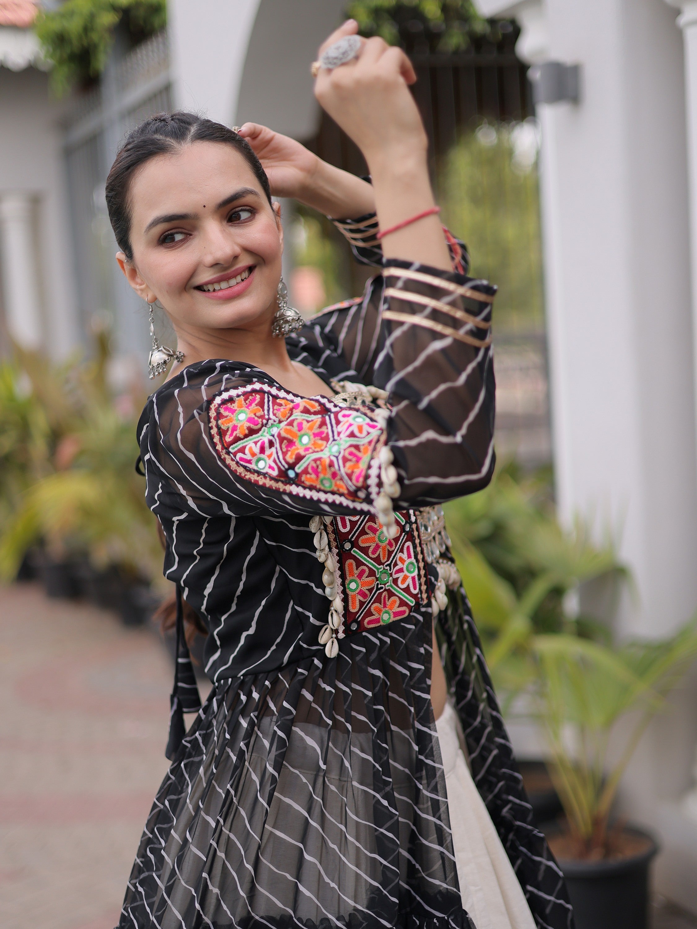 Grand Black Laheriya Printed Cotton Navratri Wear Lehenga With Kurti