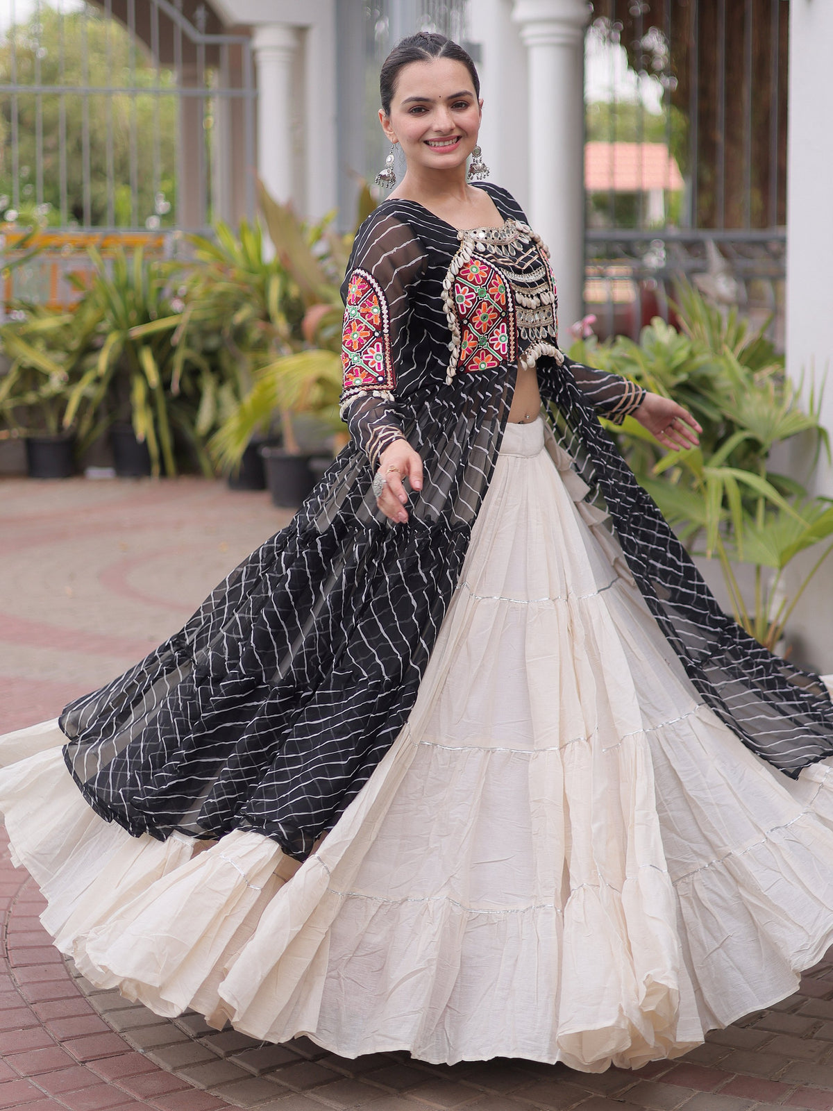 Grand Black Laheriya Printed Cotton Navratri Wear Lehenga With Kurti