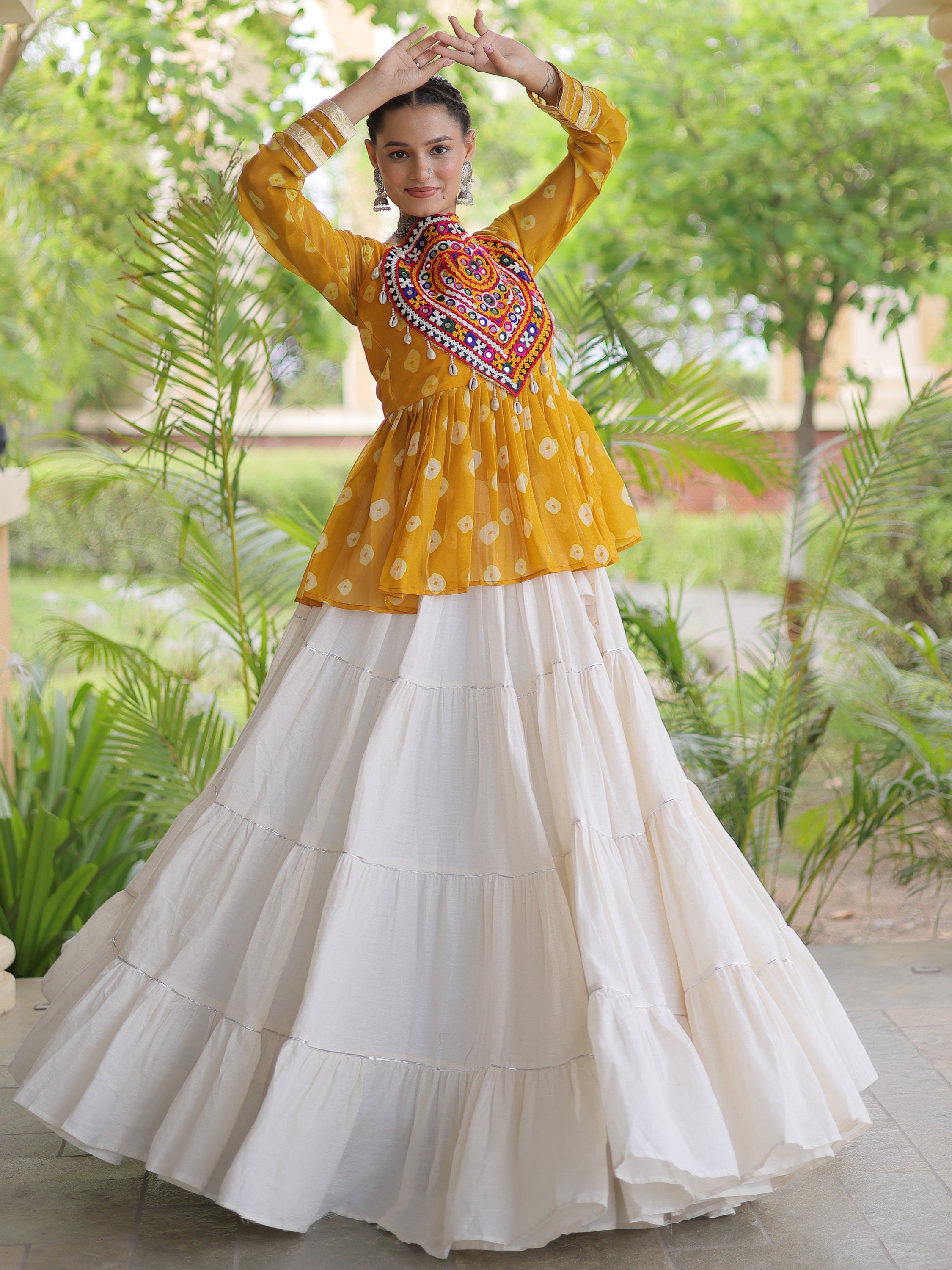 Pretty Mustard Yellow Cotton Navratri Lehenga With Patch Work Peplum Top
