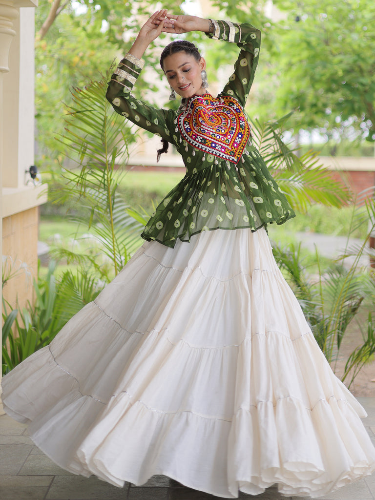 Attractive Green Cotton Navratri Lehenga With Patch Work Peplum Top