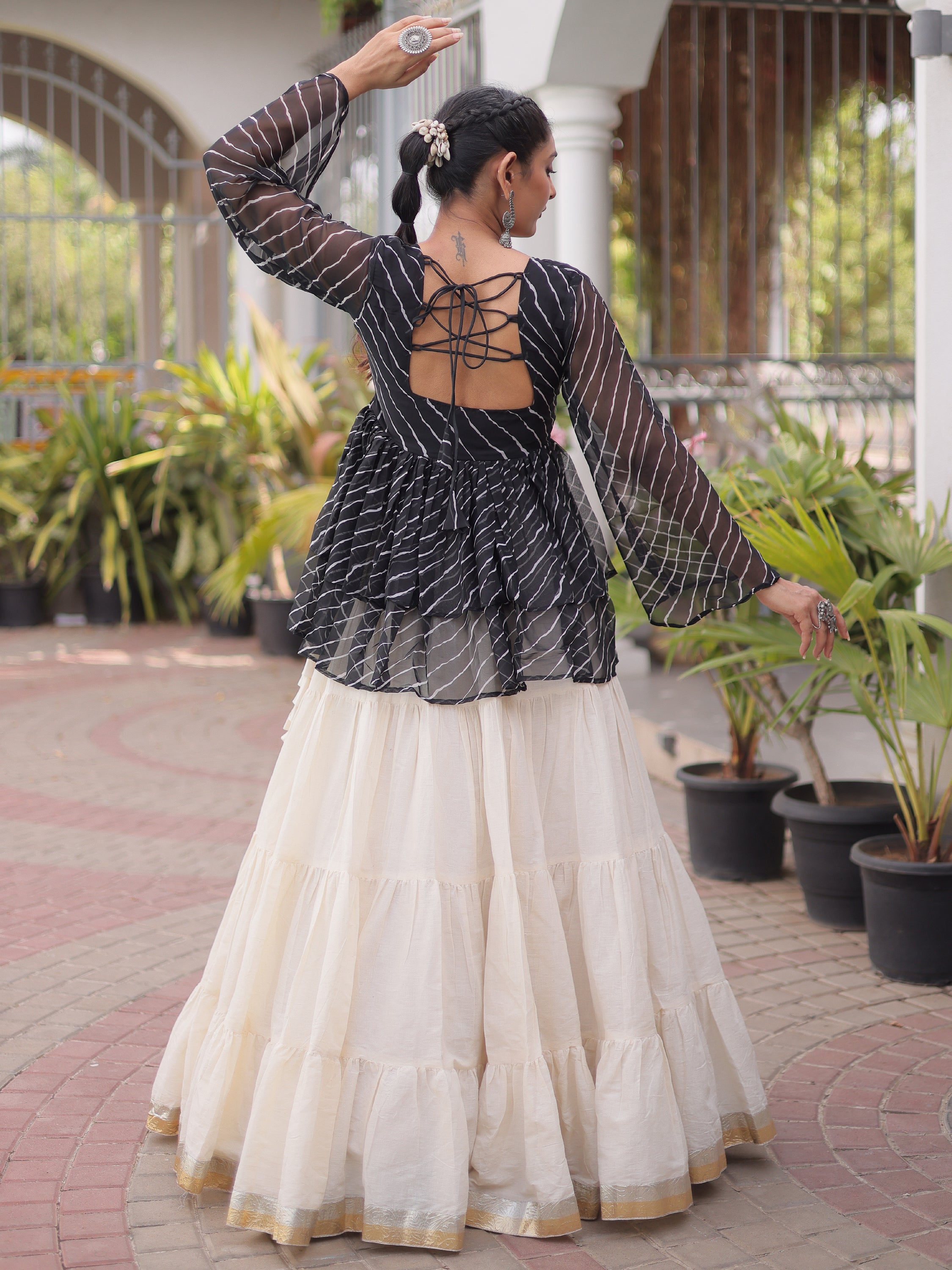 Captivating Black Laced Cotton Navratri Special Lehenga With Peplum Top