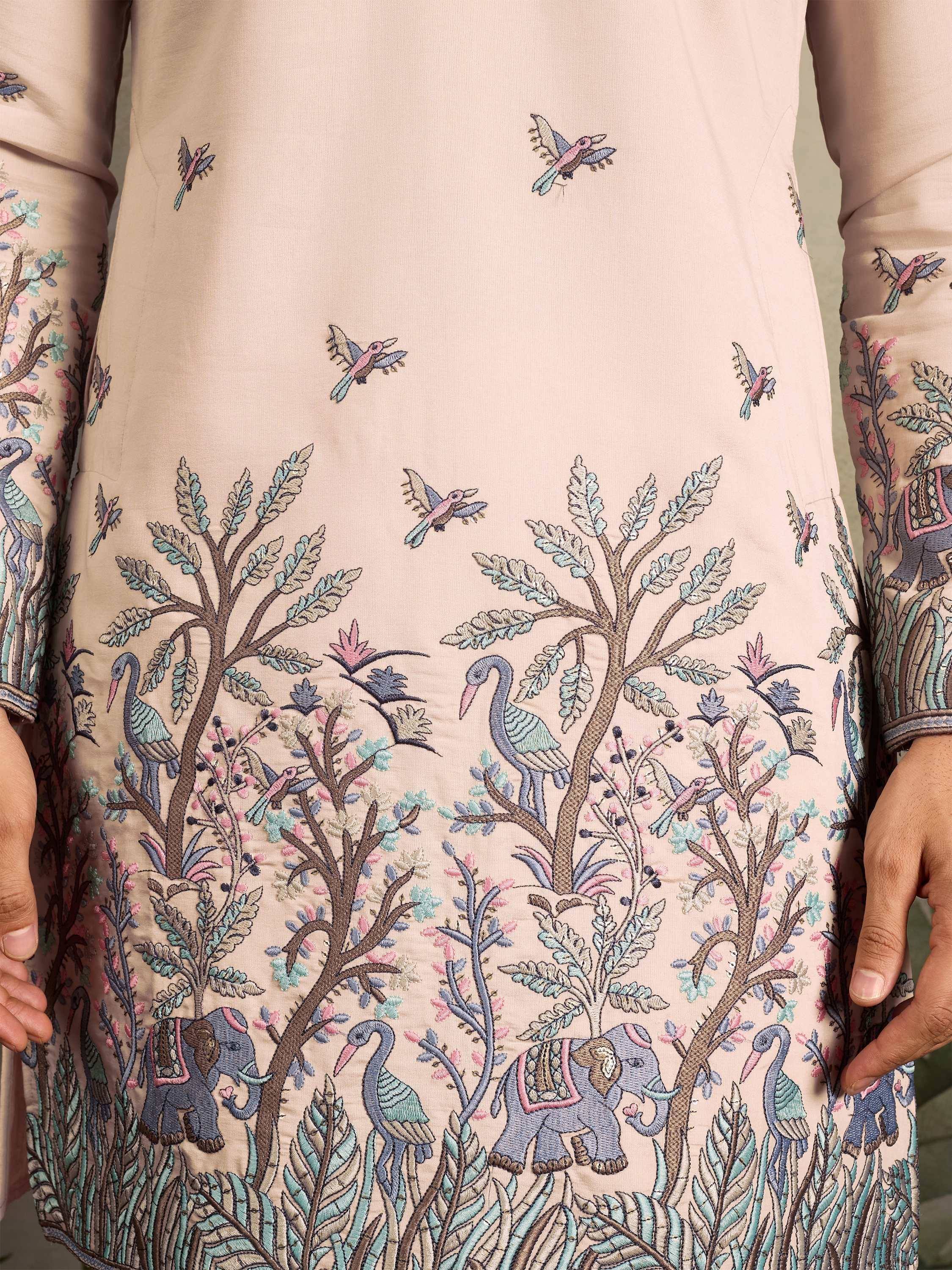 Beige ethnic kurta with embroidered elephants, birds, and trees for women's traditional wear