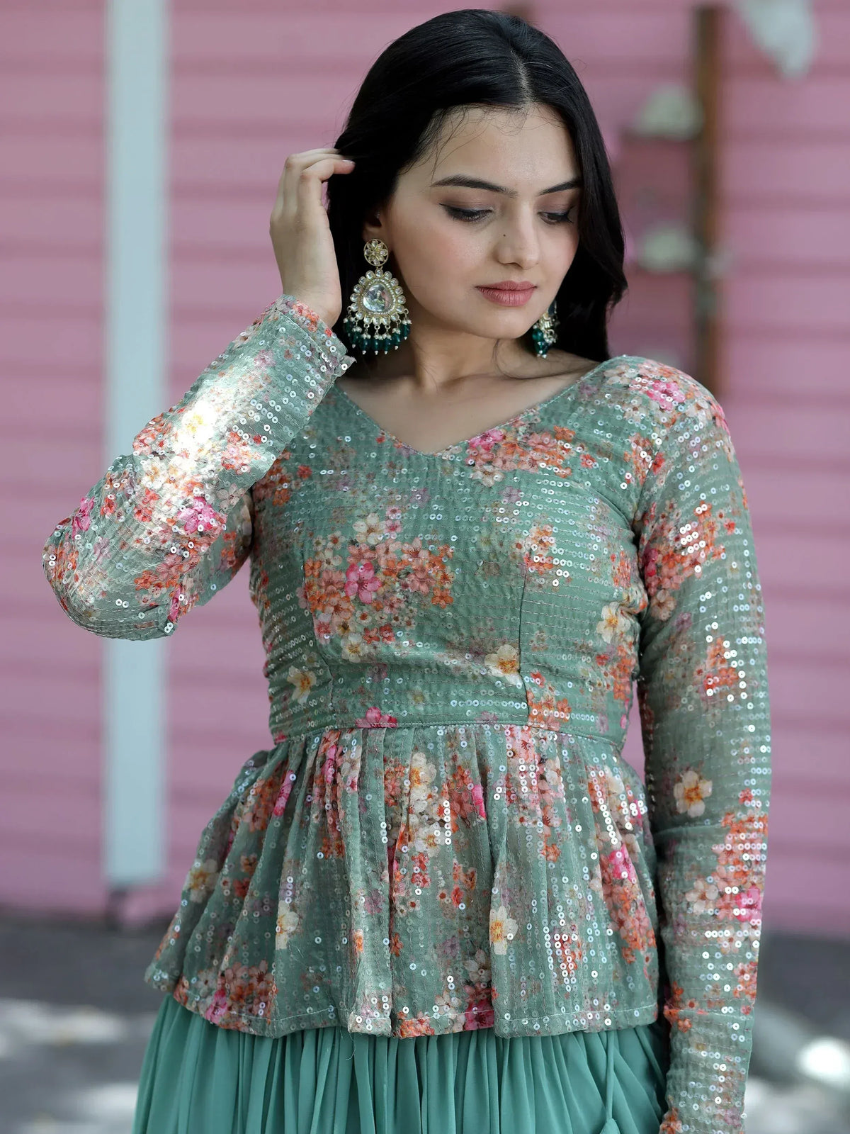 Green floral sequin ethnic gown with long sleeves and pleated skirt, perfect for Indian occasions