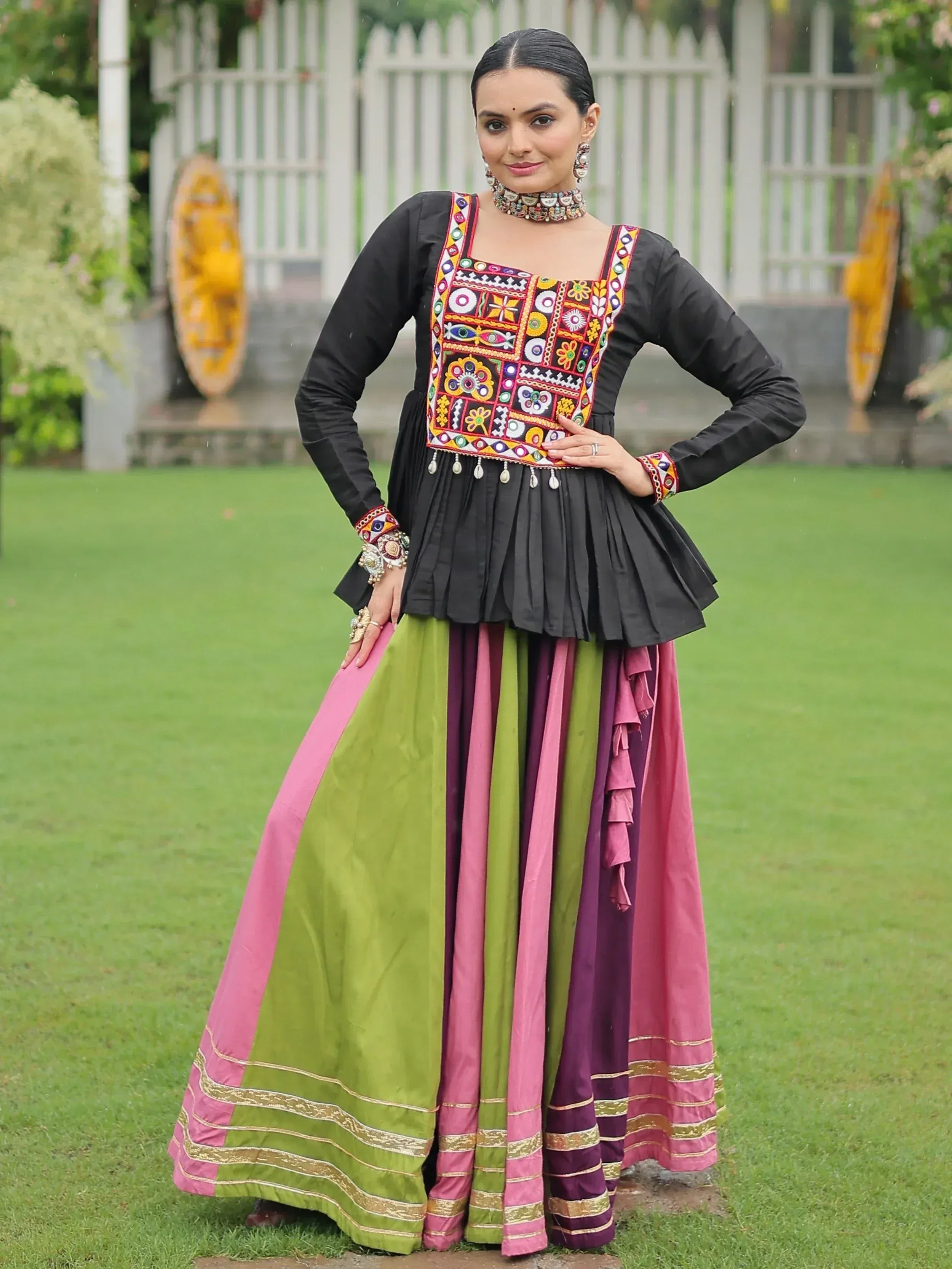 Black embroidered top with colorful panel and green pink skirt, Indian ethnic wear