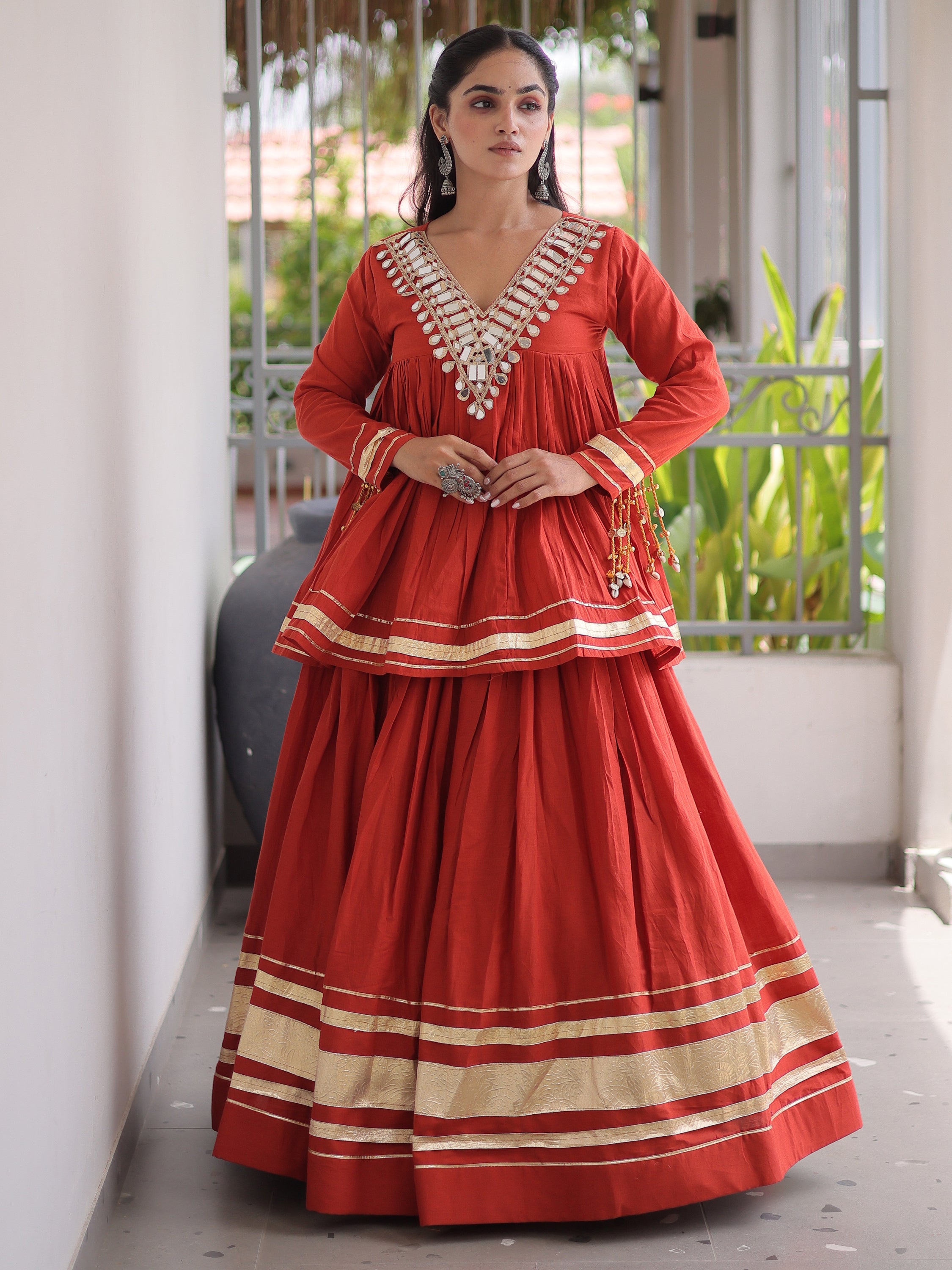 Rich Rust Orange Gota-Laced Festive Wear Lehenga With Peplum Top