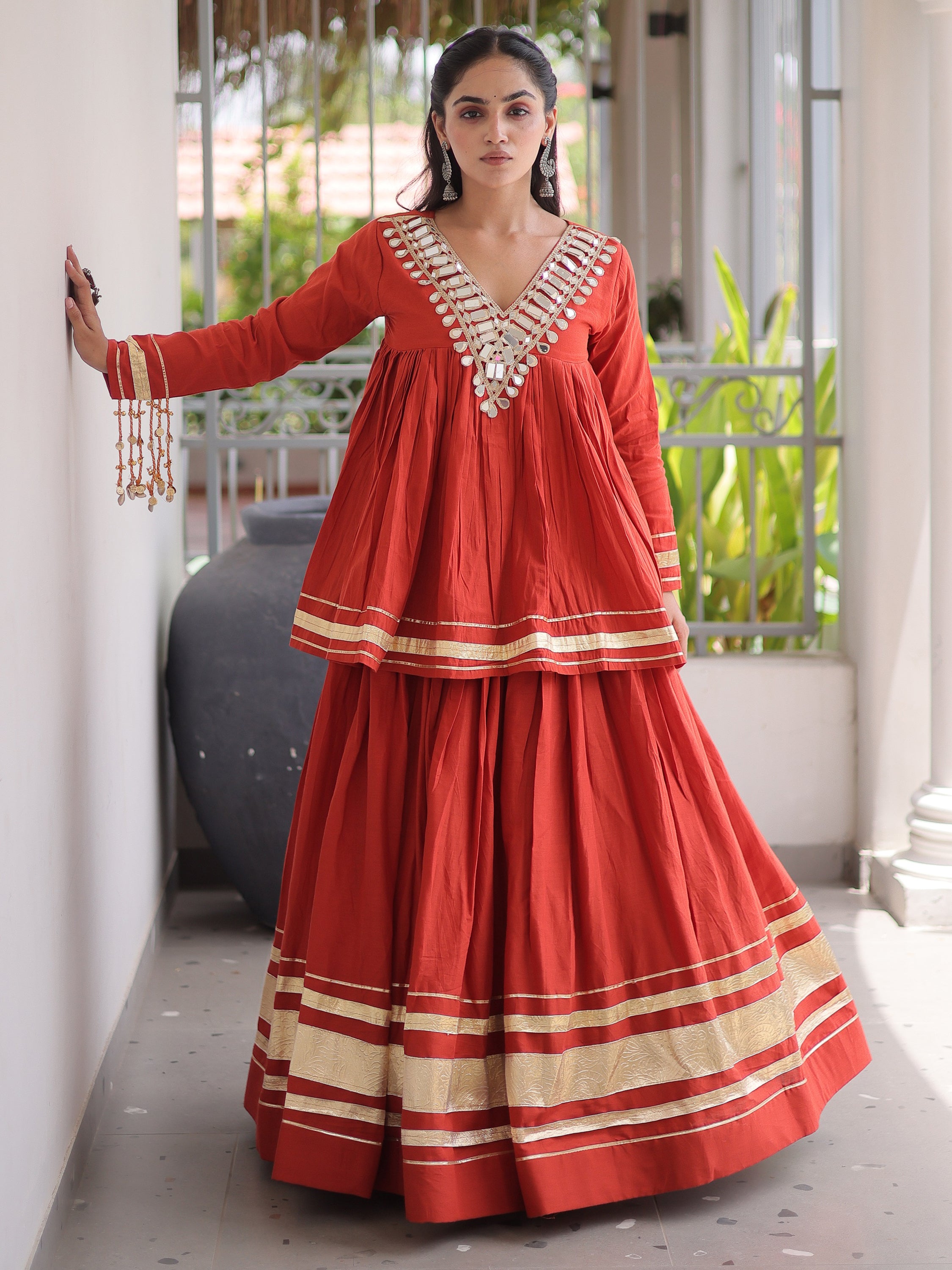 Rich Rust Orange Gota-Laced Festive Wear Lehenga With Peplum Top