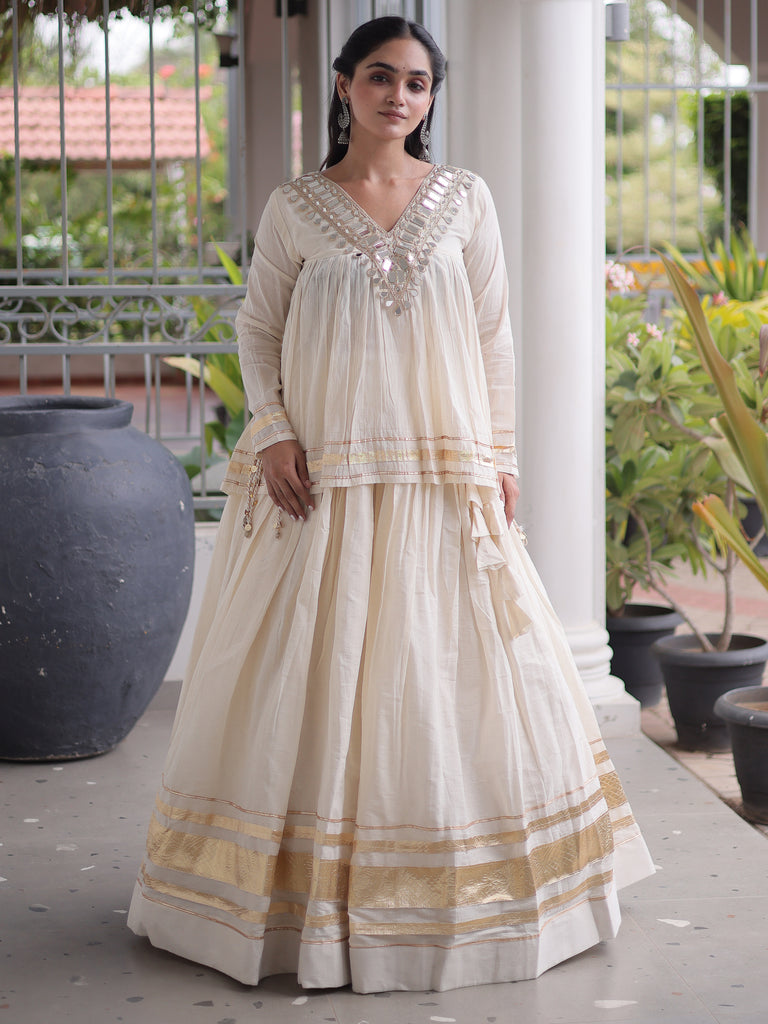 Alluring White Mirror Laced Navratri Wear Lehenga With Peplum Top