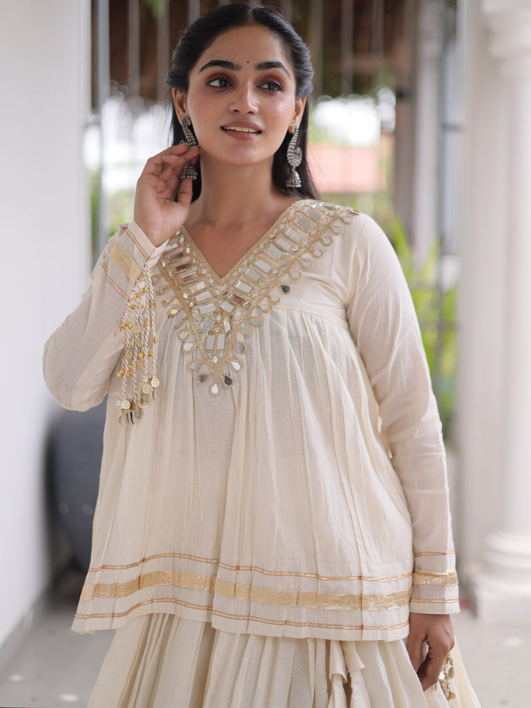 Alluring White Mirror Laced Navratri Wear Lehenga With Peplum Top