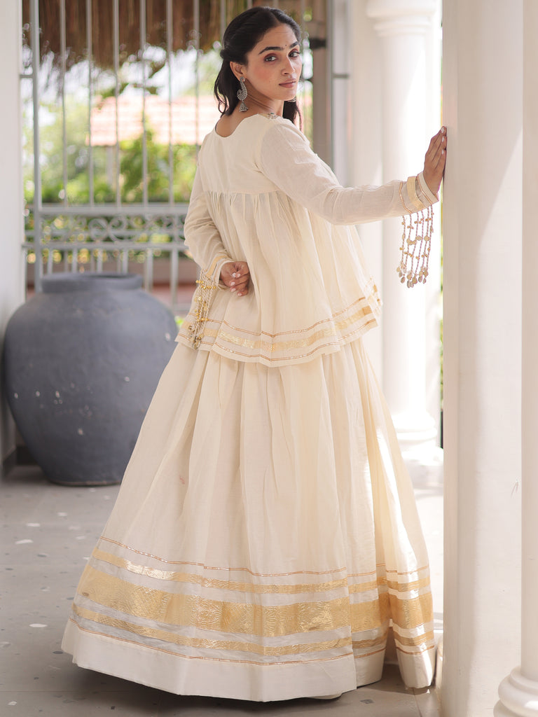 Alluring White Mirror Laced Navratri Wear Lehenga With Peplum Top