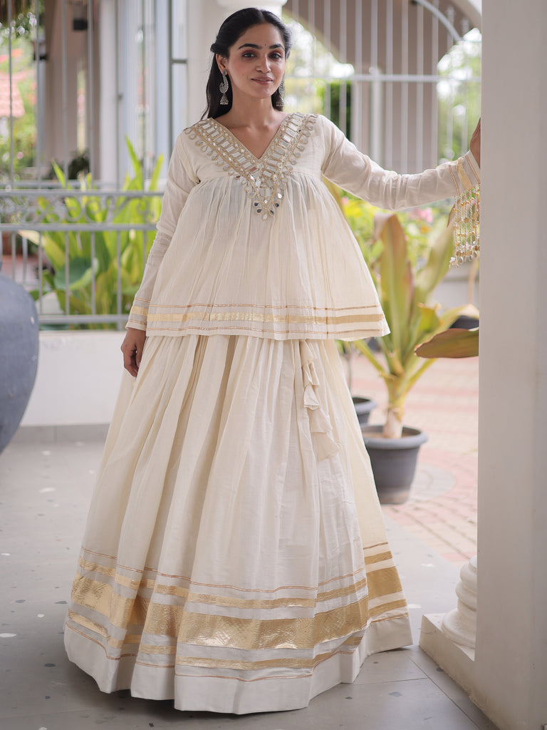 Alluring White Mirror Laced Navratri Wear Lehenga With Peplum Top