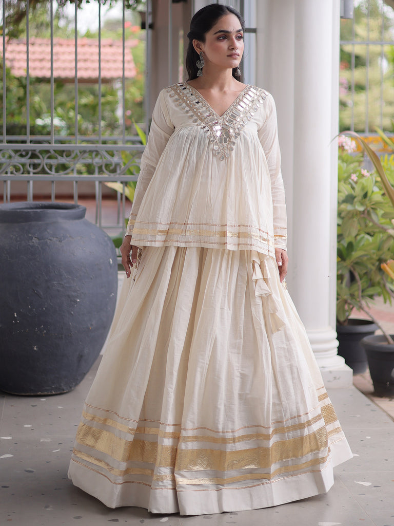 Alluring White Mirror Laced Navratri Wear Lehenga With Peplum Top