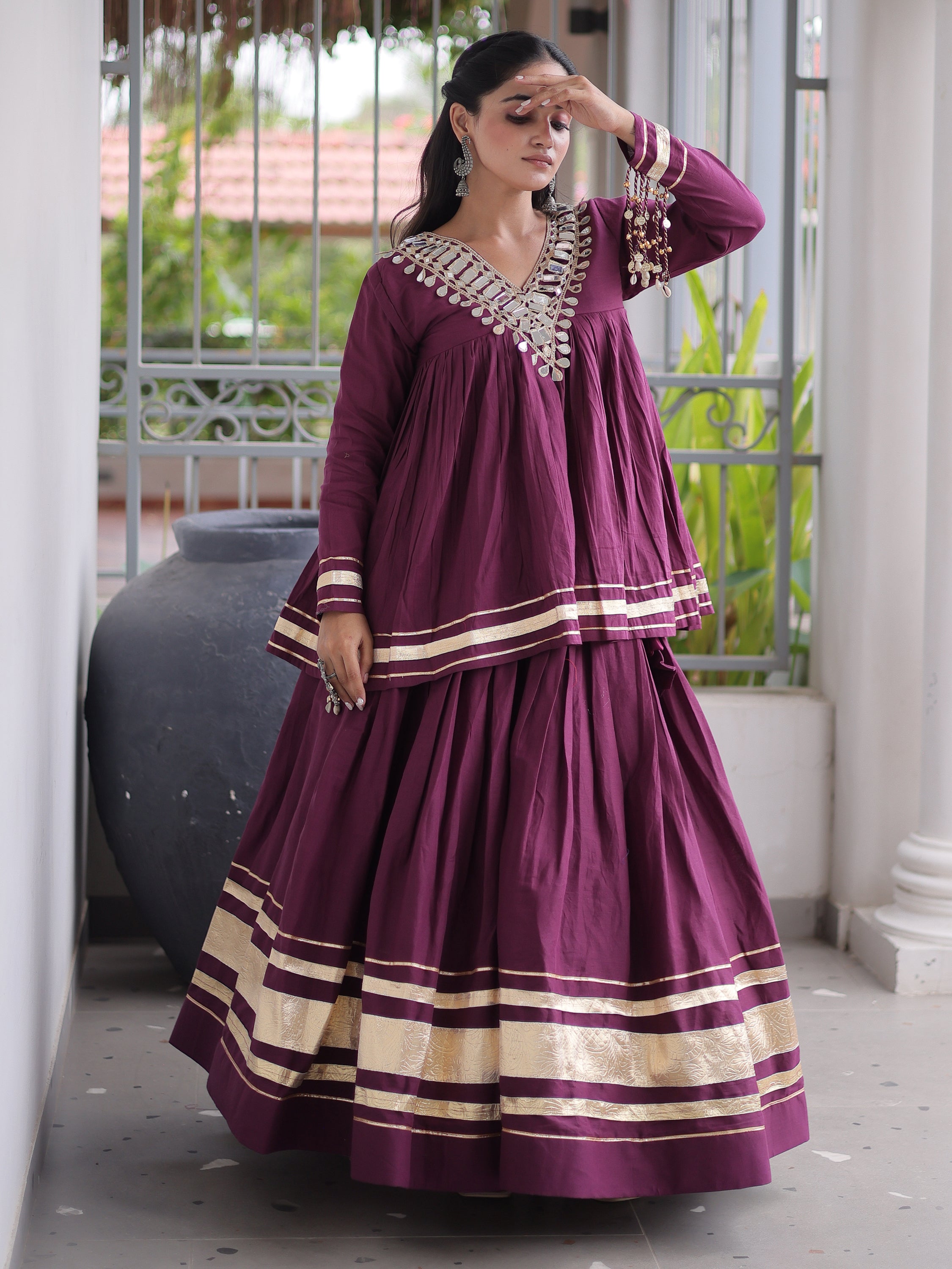 Classy Wine Mirror Laced Navratri Special Lehenga With Peplum Top