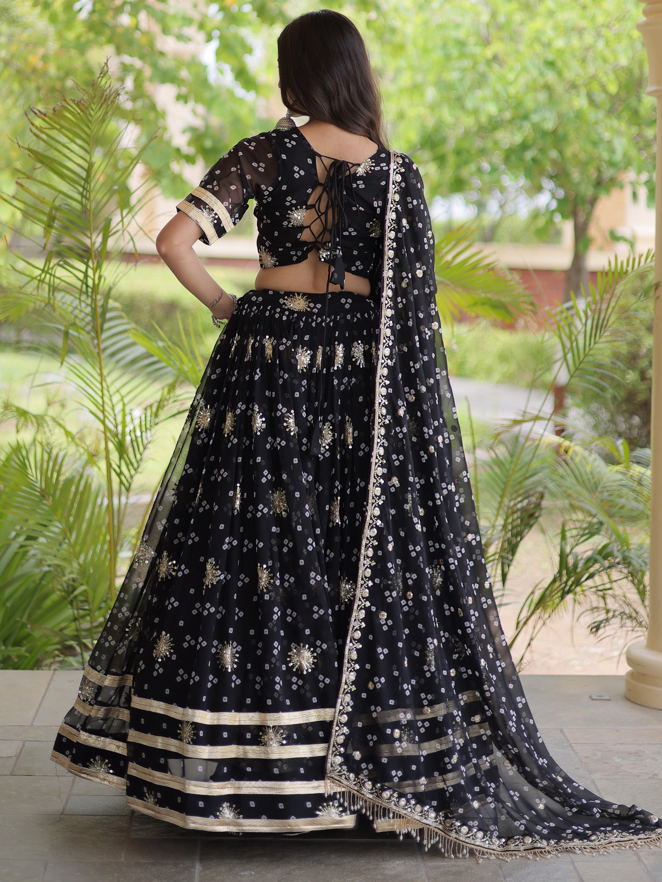 Spectacular Black Bandhej Printed Georgette Navratri Lehenga Choli