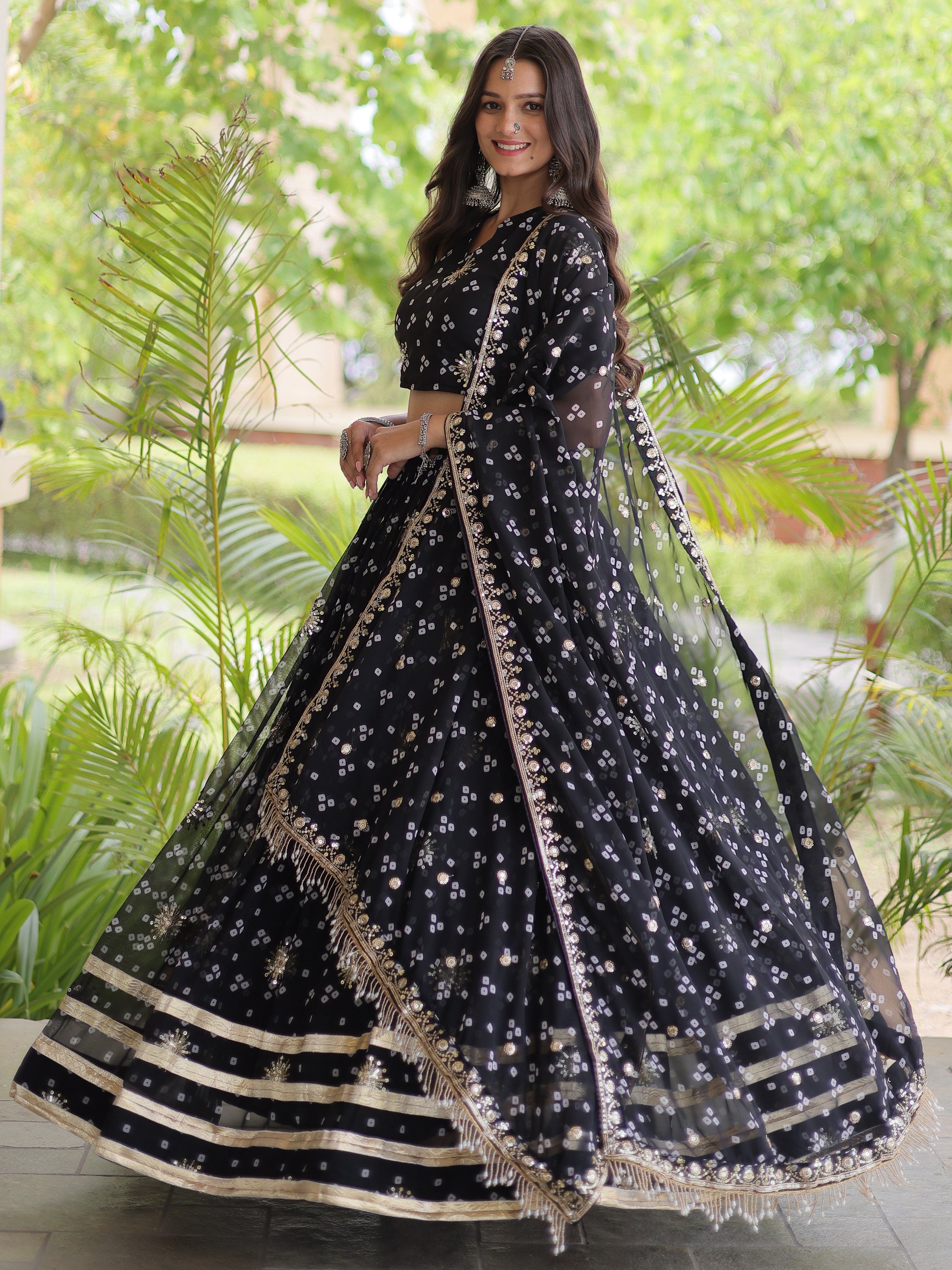 Spectacular Black Bandhej Printed Georgette Navratri Lehenga Choli