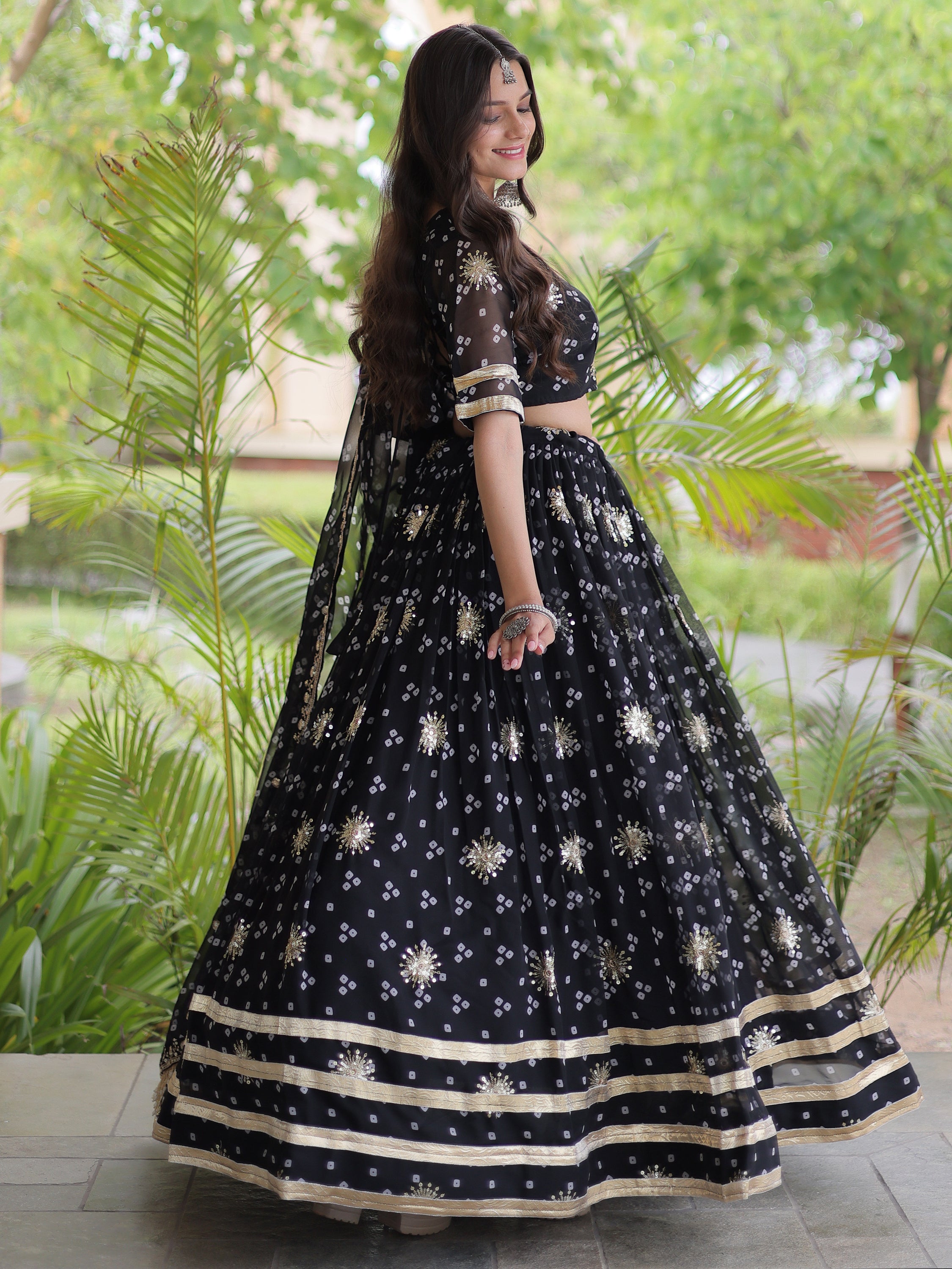 Spectacular Black Bandhej Printed Georgette Navratri Lehenga Choli