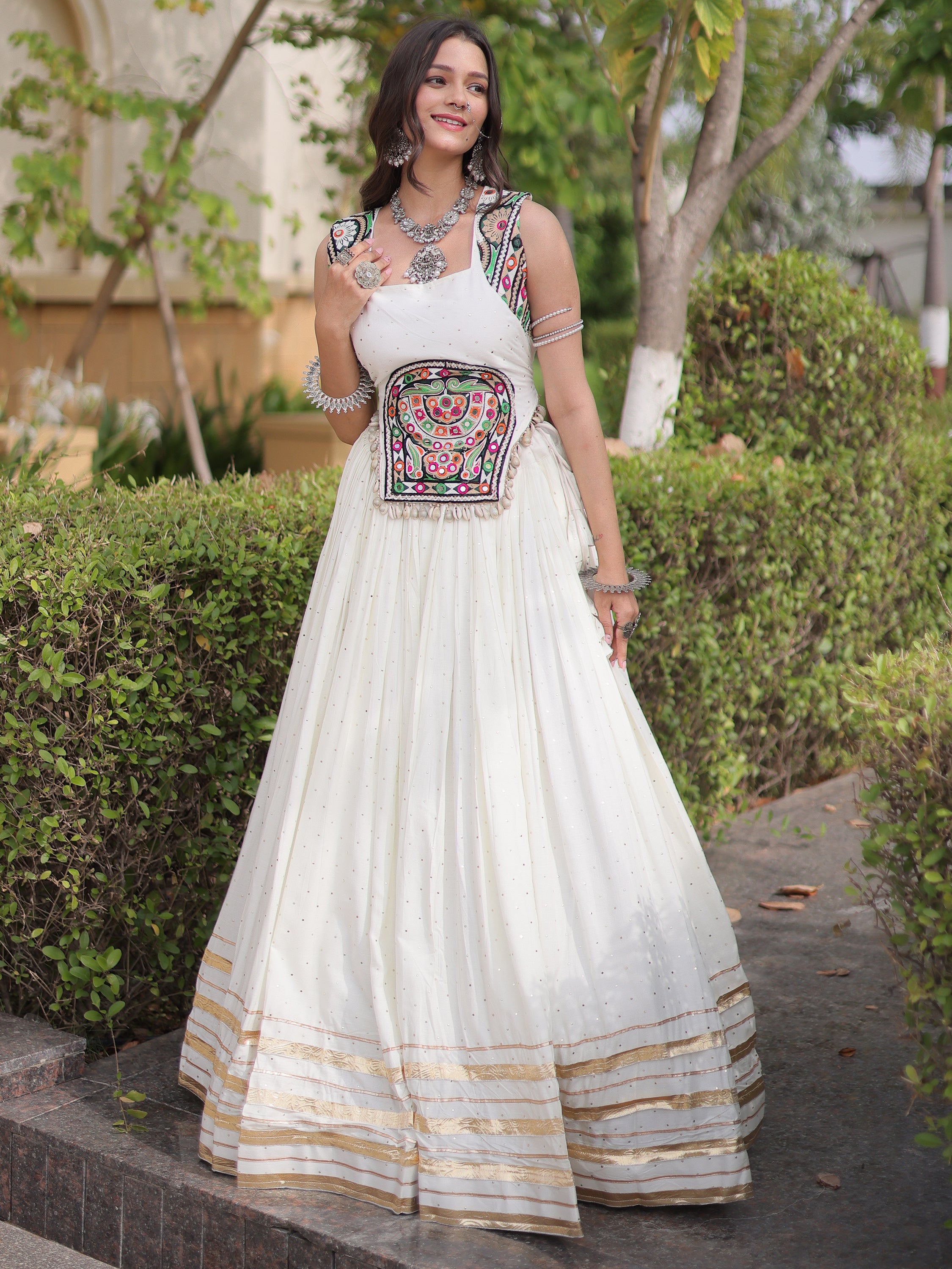 Attractive White Navratri Special Lehenga With Gamthi Work Choli