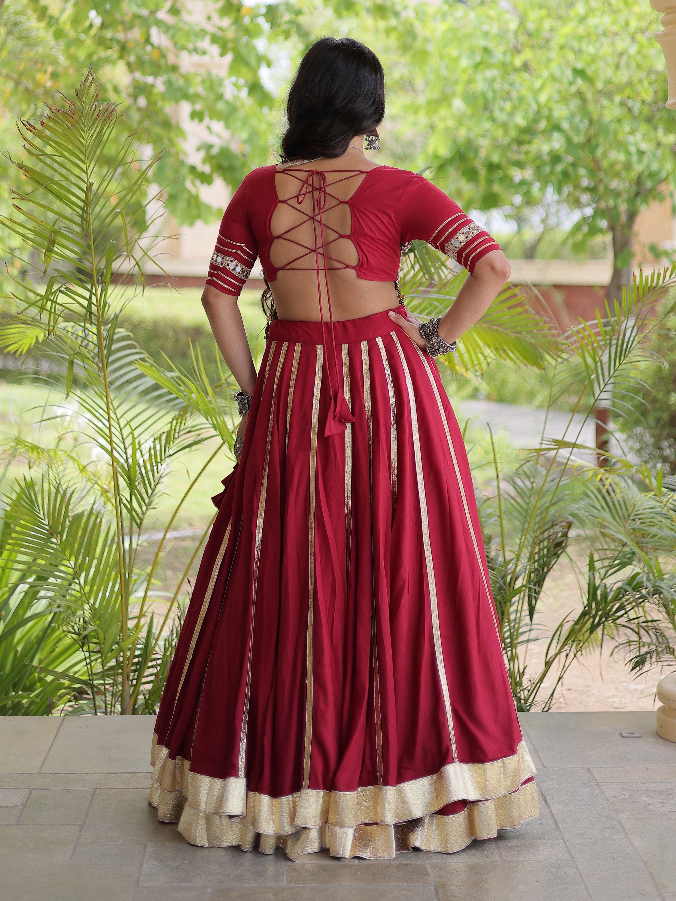Glowing Maroon Gamthi Embroidered Rayon Navratri Wear Lehenga Choli