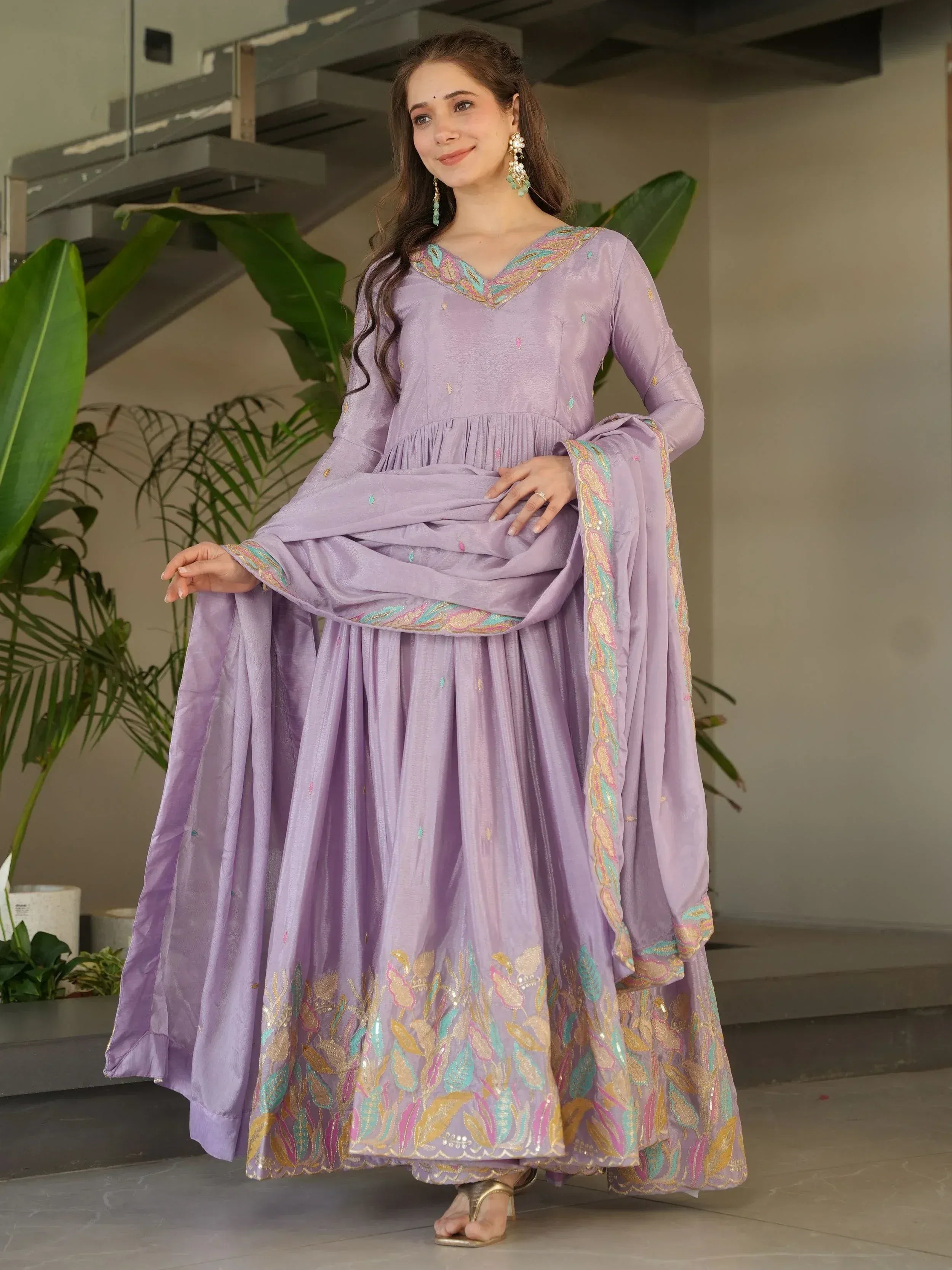 Lavender ethnic anarkali suit with floral embroidery and dupatta, perfect for Indian occasions