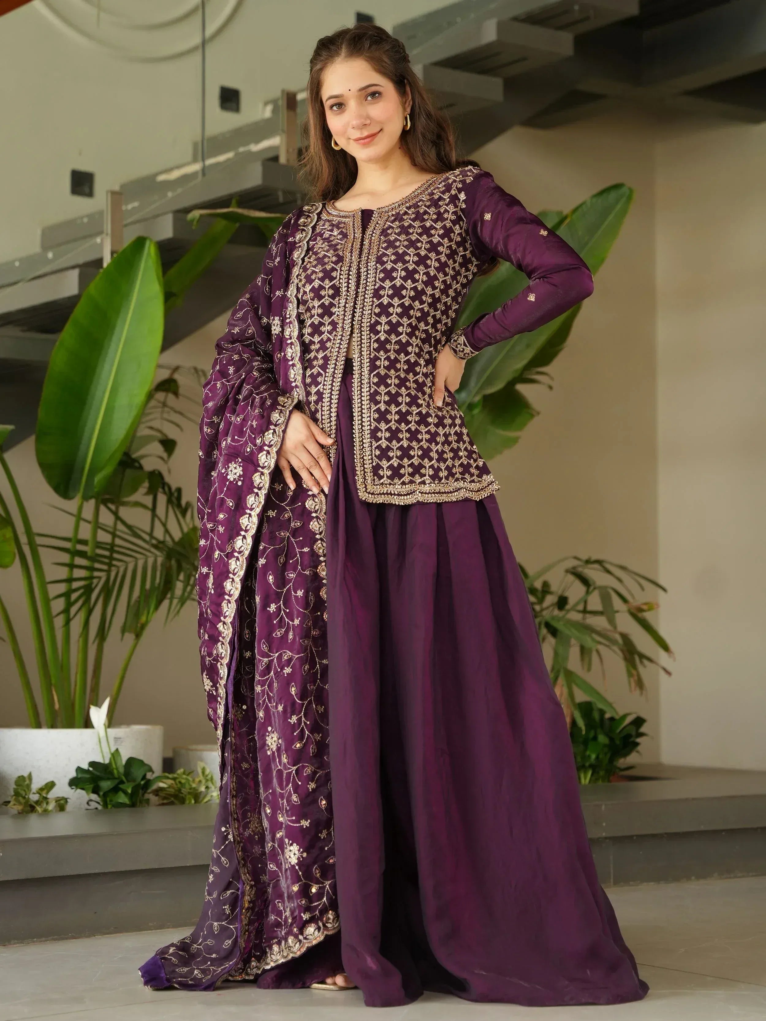 Purple embroidered salwar kameez with gold detailing, perfect for Indian ethnic wear occasions