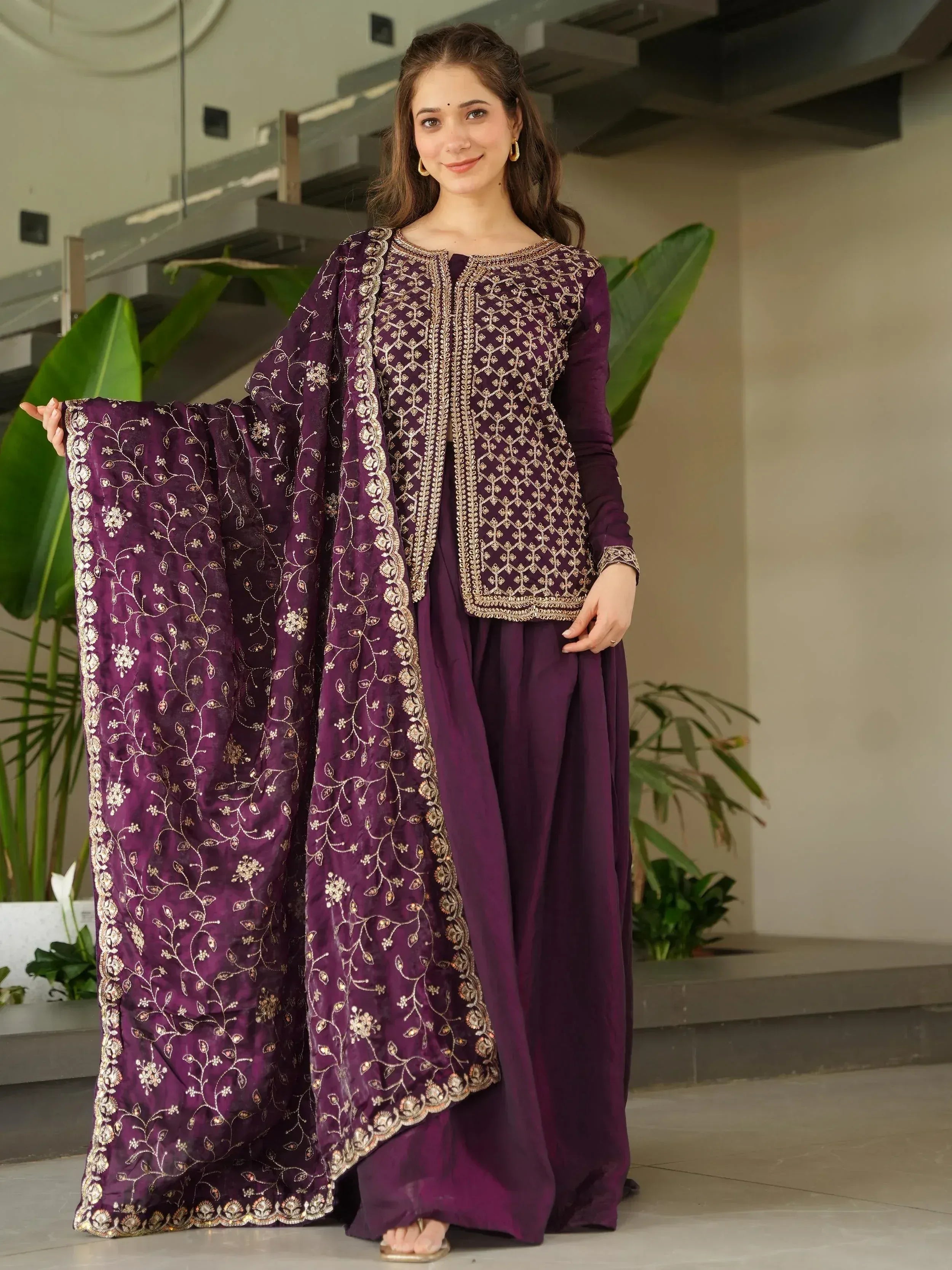 Purple embroidered salwar kameez with gold detailing, perfect for Indian ethnic wear occasions.