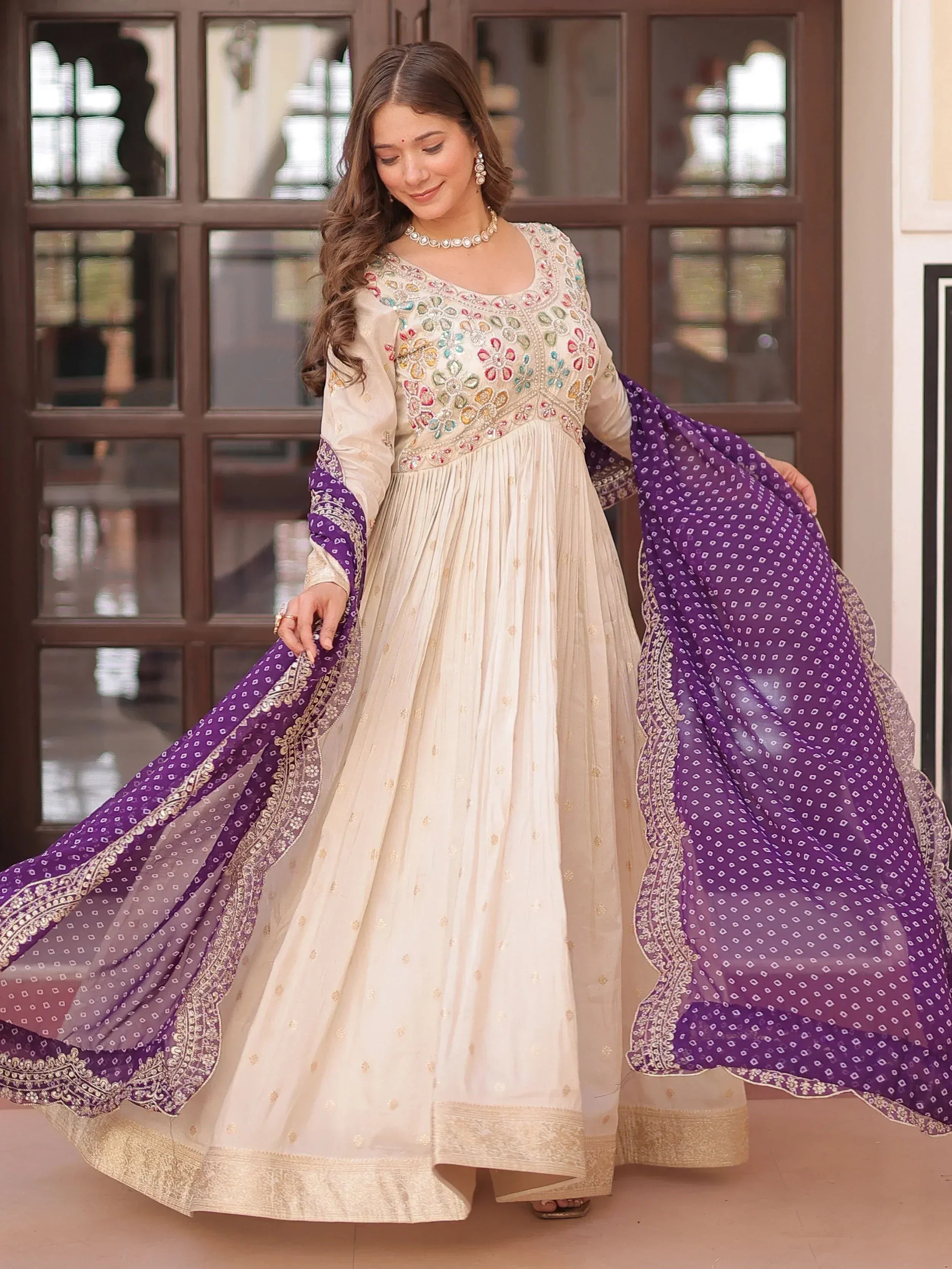 Elegant cream anarkali with colorful embroidery and purple dupatta, Indian ethnic wear