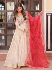 Charming Cream Silk Pearl Work Gown With Bandhani Dupatta
