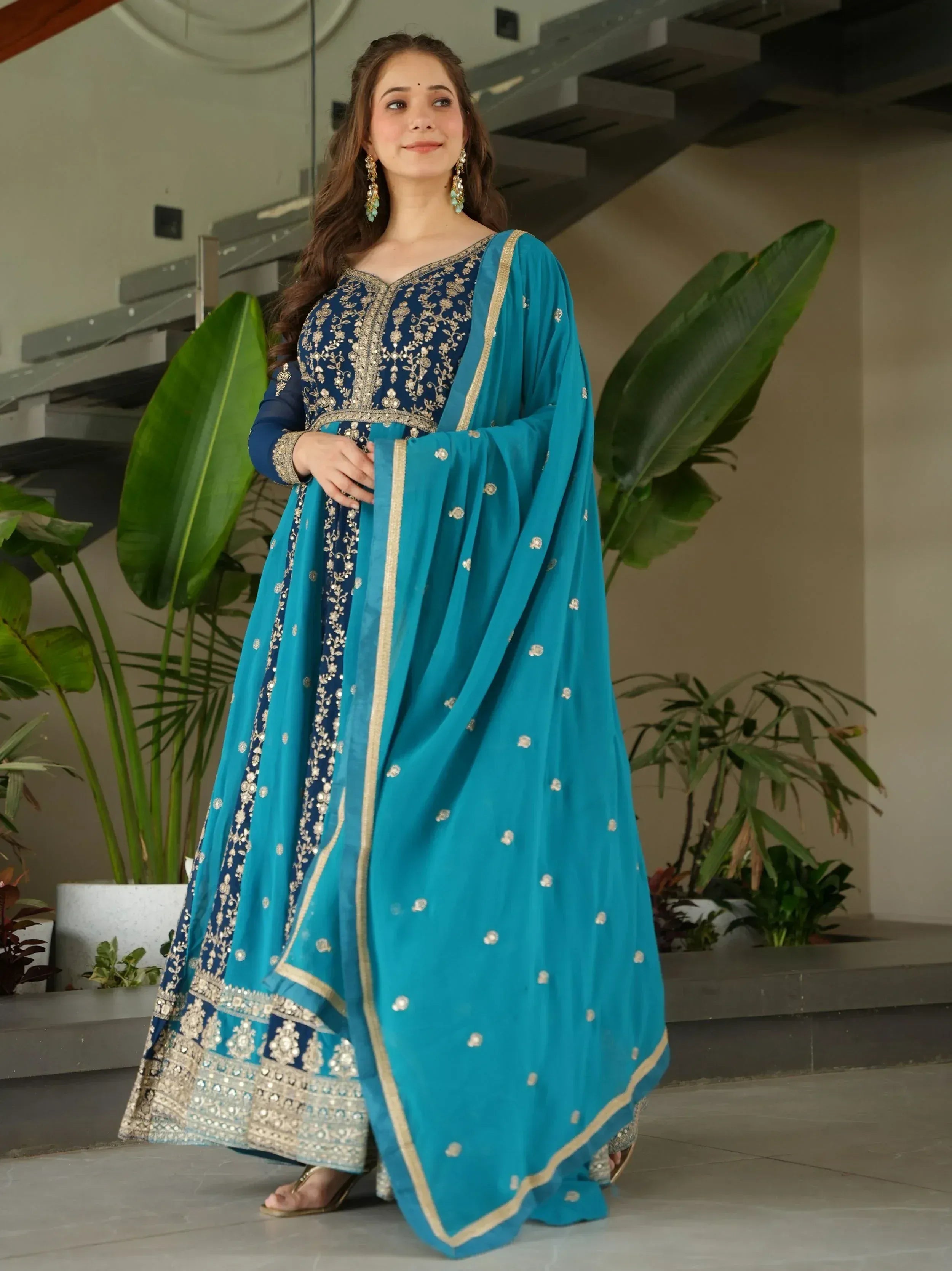 Blue embroidered Indian salwar kameez with gold detailing and matching dupatta, perfect for ethnic occasions