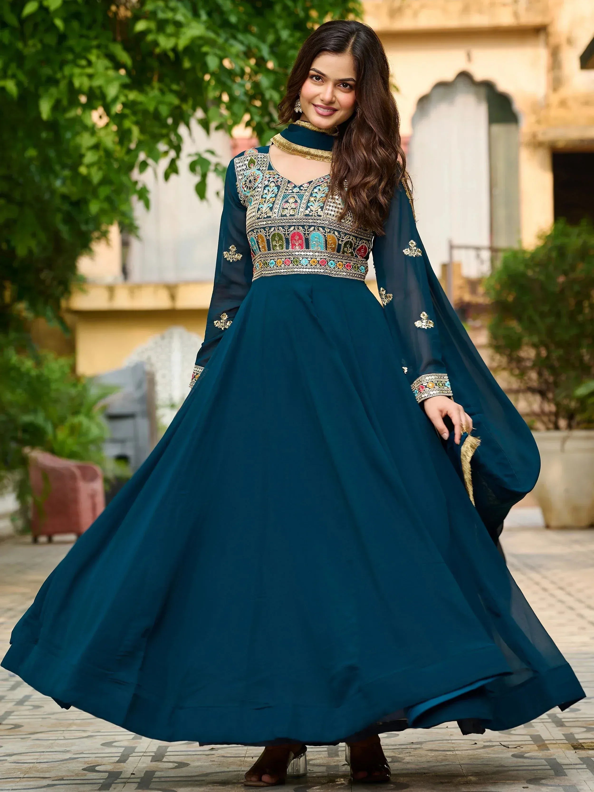 Teal embroidered anarkali gown with flared skirt, perfect for Indian ethnic wear occasions